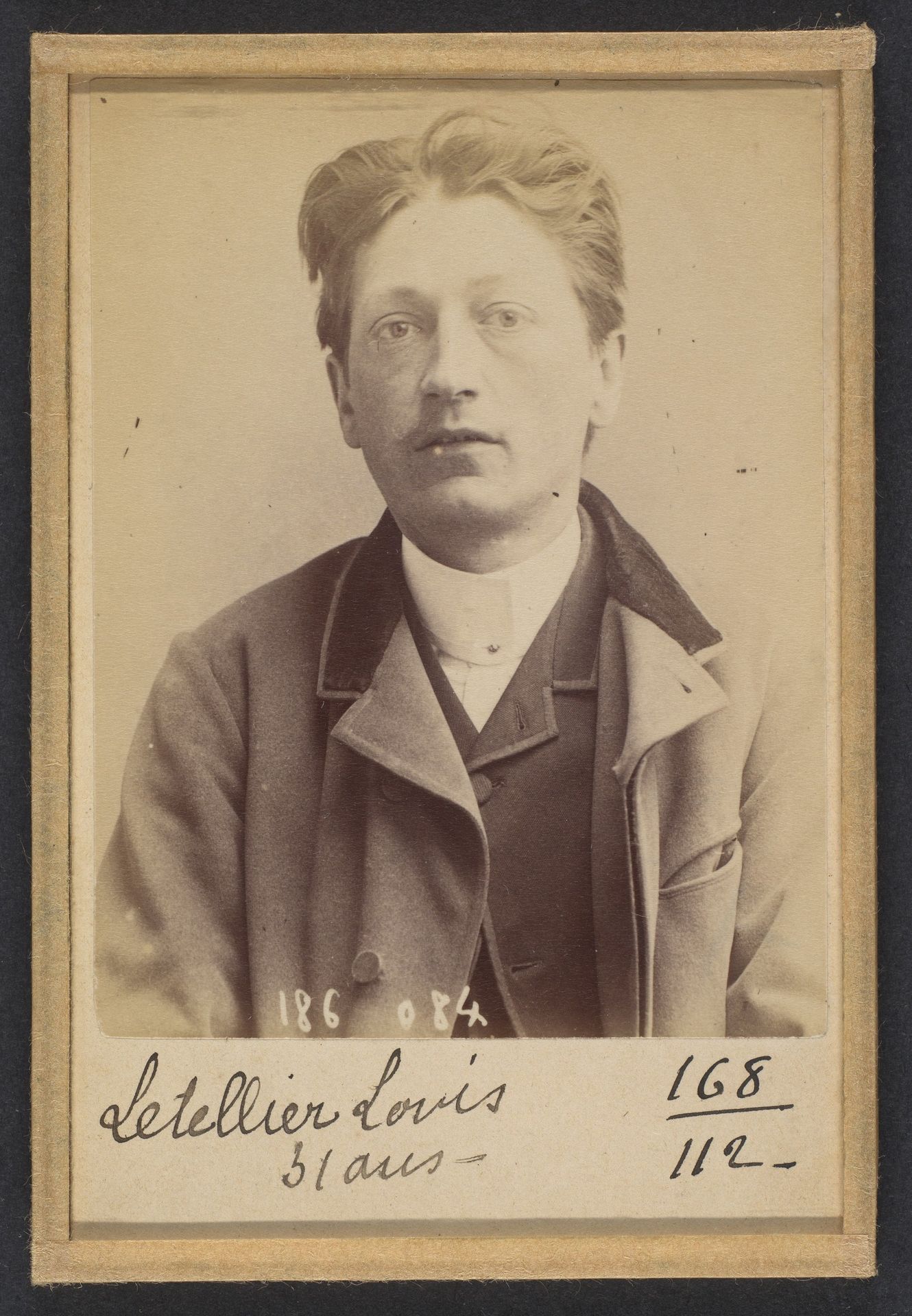 Letellier. Louis, Auguste. 29 ans, né à Rouen (Seine-Inférieure). Employé. Anarchiste. 23/4/92. by Alphonse Bertillon