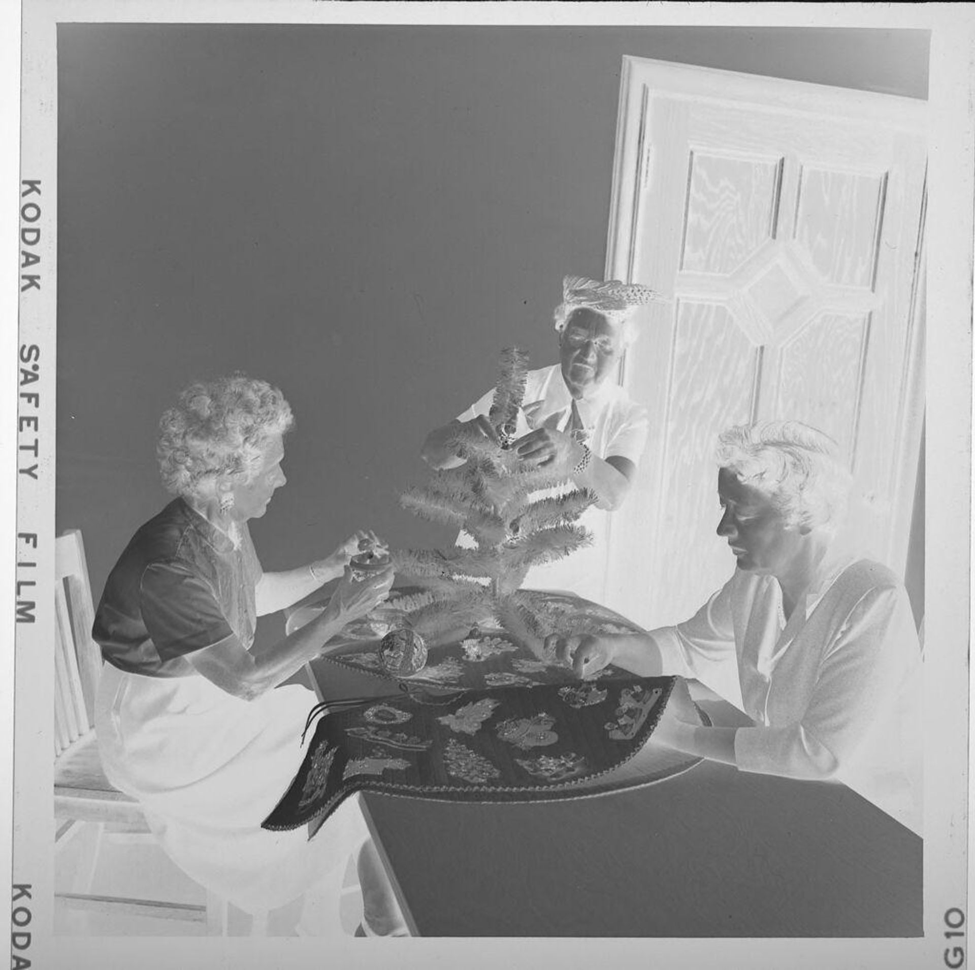 Untitled (women making crafts, wreathes) by Jack Gould