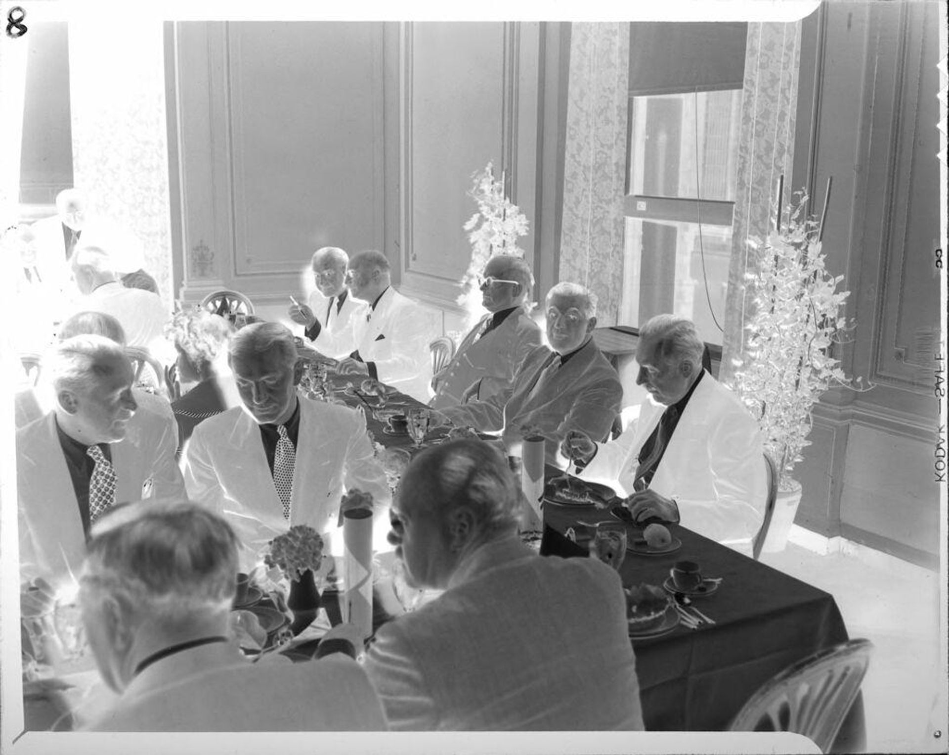 Untitled (people at banquet) by Peter James Studio
