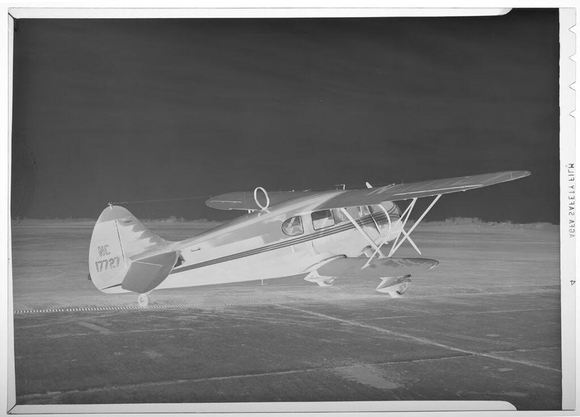 Untitled (small plane on Robertson, MO airstrip) by Martin Schweig