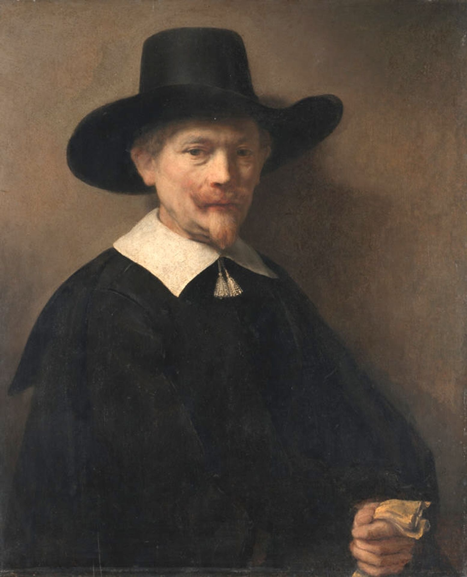 Portrait of a Man Holding Gloves by Rembrandt van Rijn