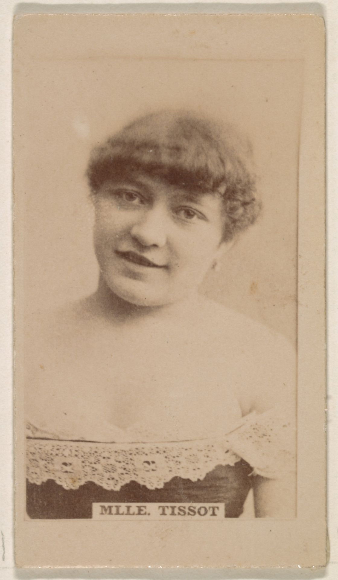 Mlle. Tissot, from the Actresses series (N245) issued by Kinney Brothers to promote Sweet Caporal Cigarettes by Kinney Brothers Tobacco Company