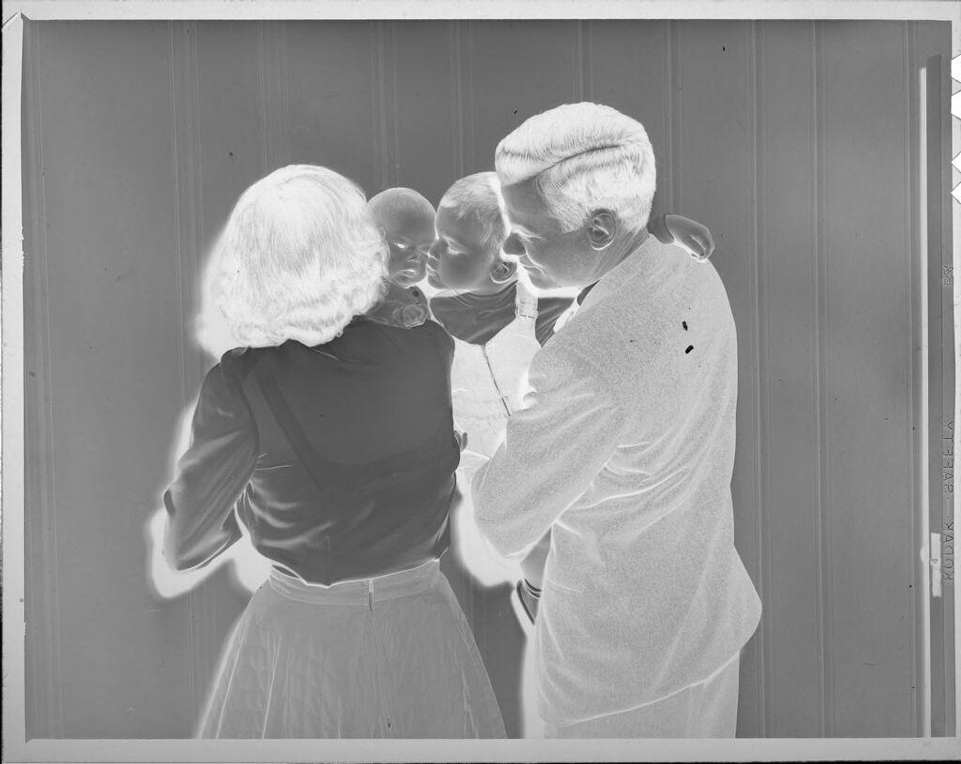 Untitled (man and woman holding two children) by Lucian and Mary Brown
