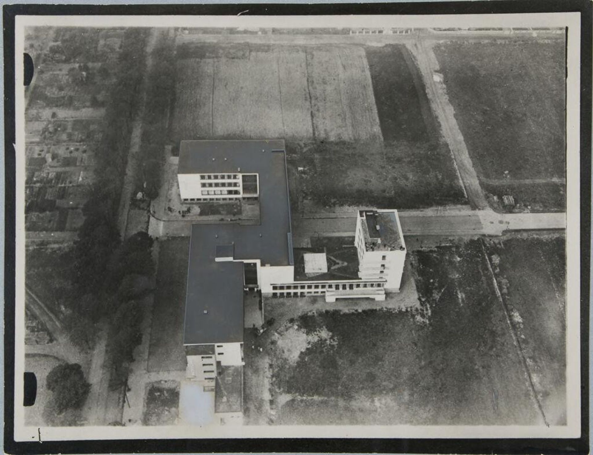 Bauhaus Building, Dessau, 1925-1926: Aerial view by Robert Petschow