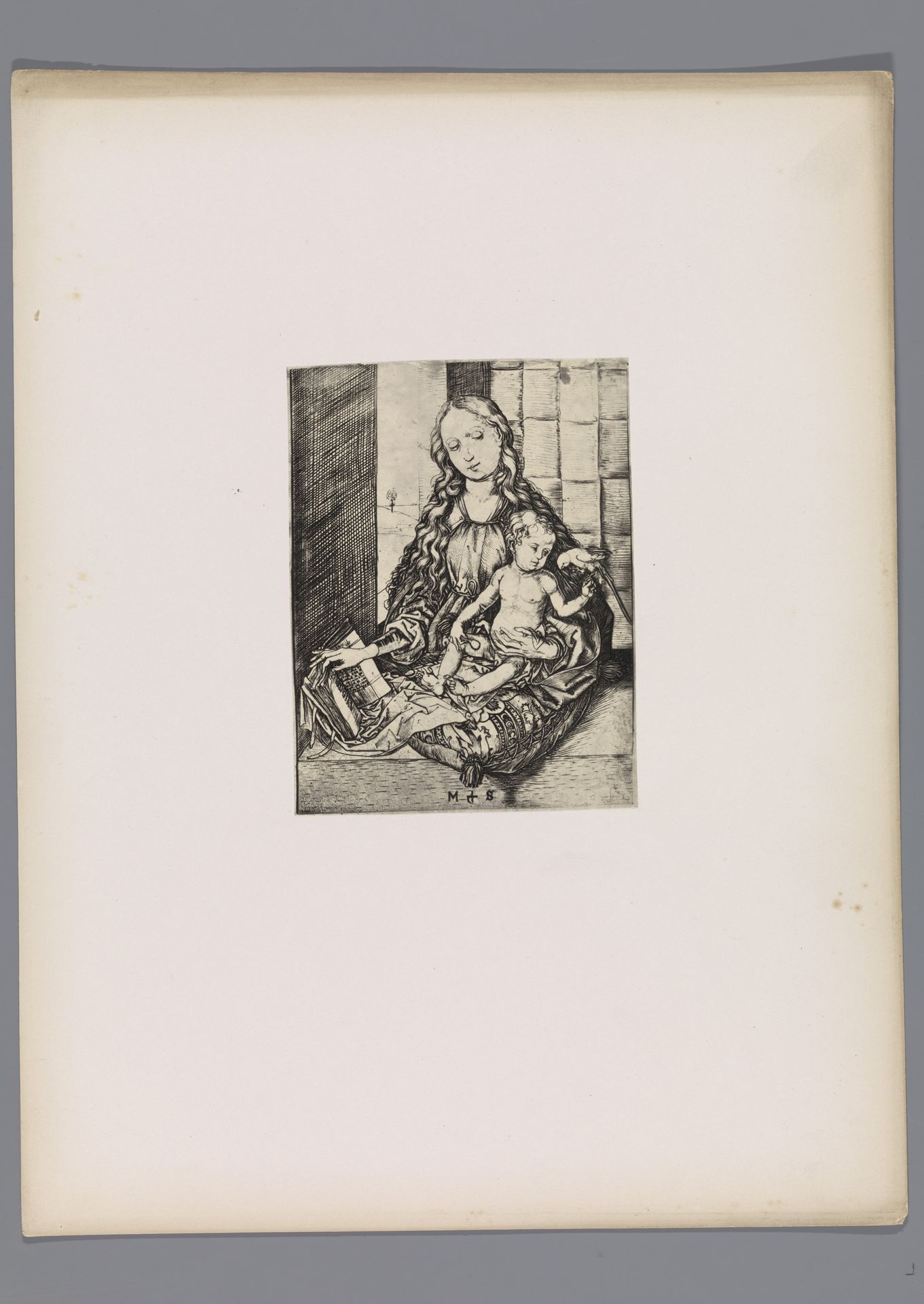 Reproductie van een prent van Maria met Christus als kind en een boek door Martin Schongauer by Simonau & Toovey