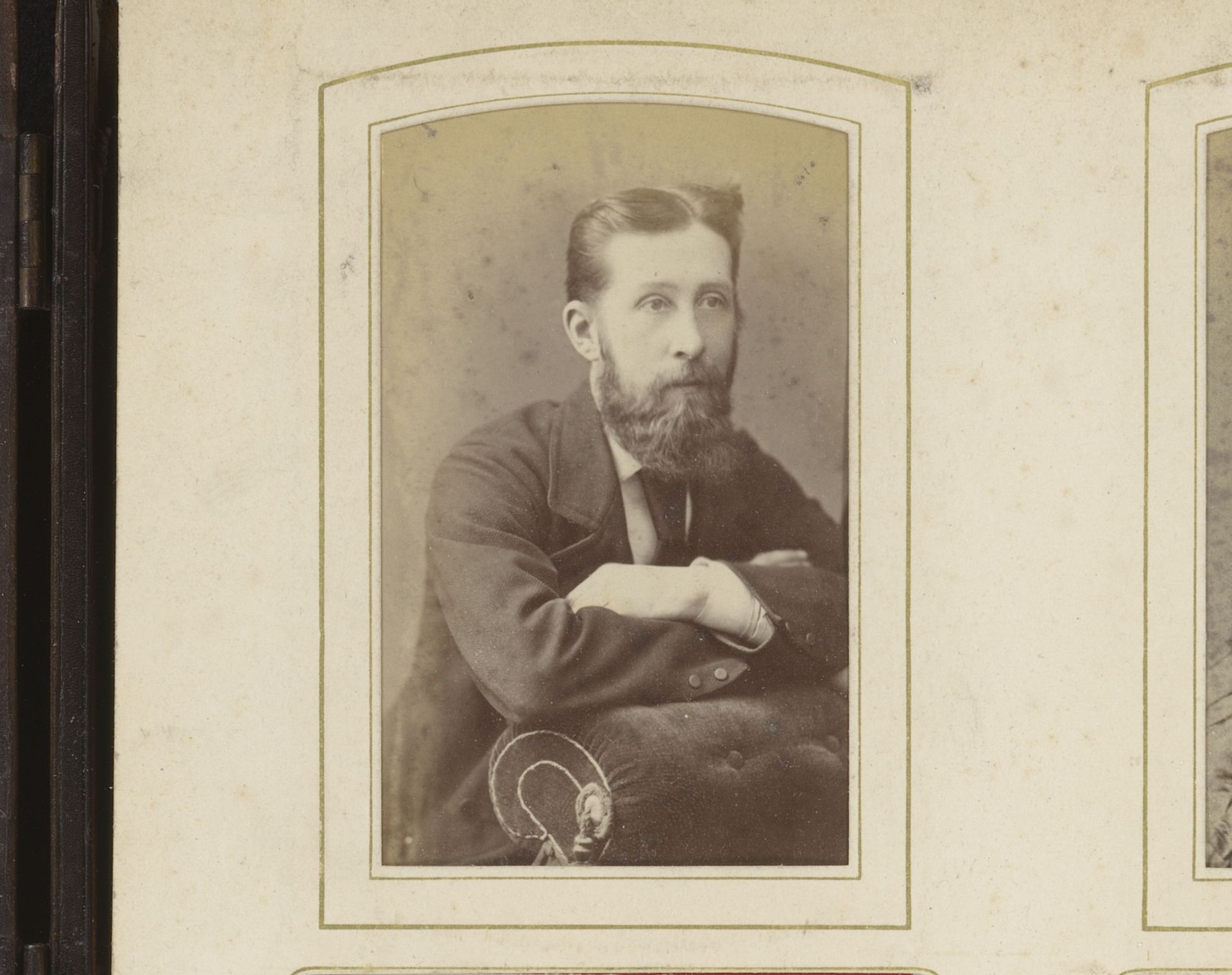 Portret van een man, leunend op een fauteuil by A.D. Lewis