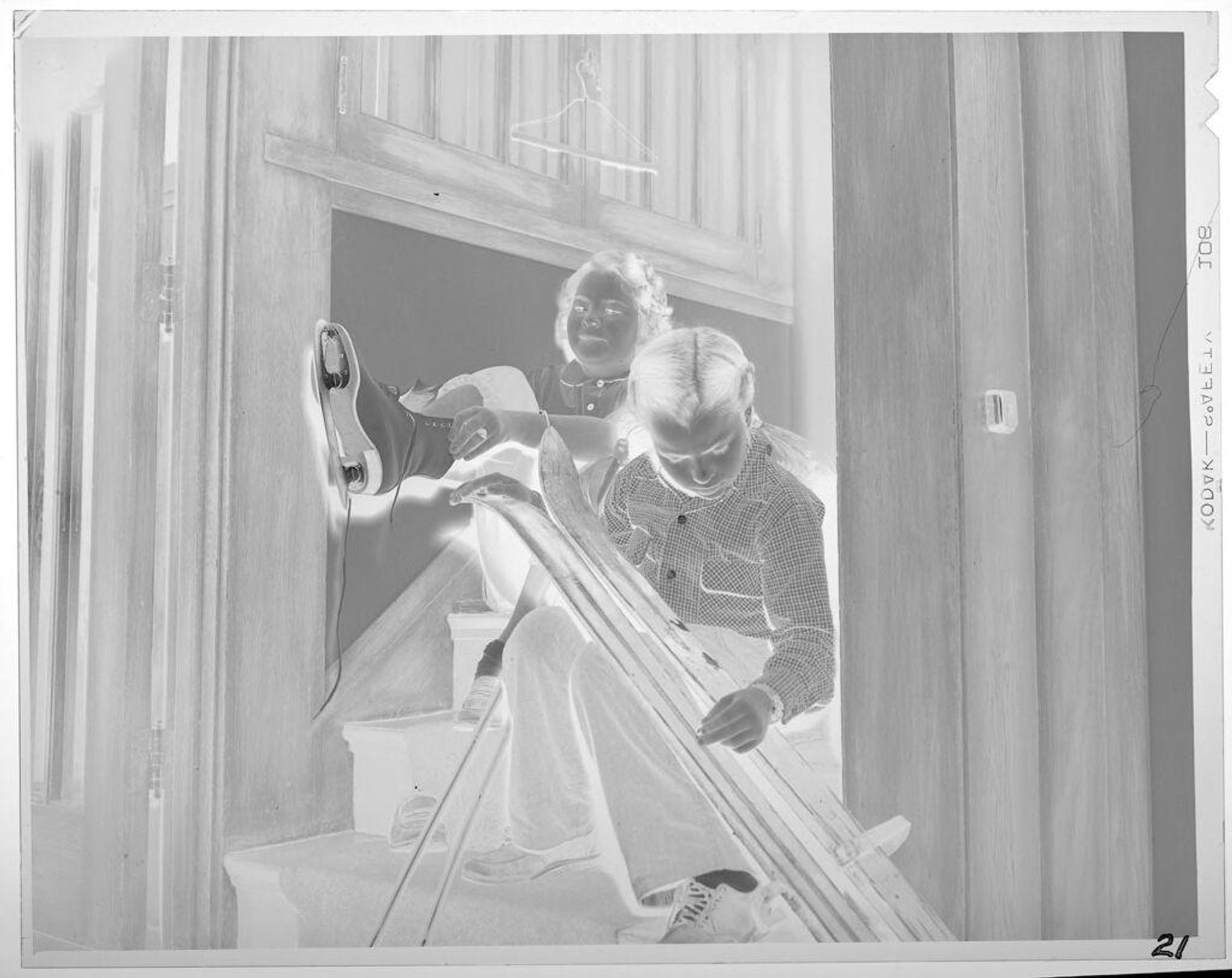 Untitled (girls with ice skates and skis) by Lucian and Mary Brown