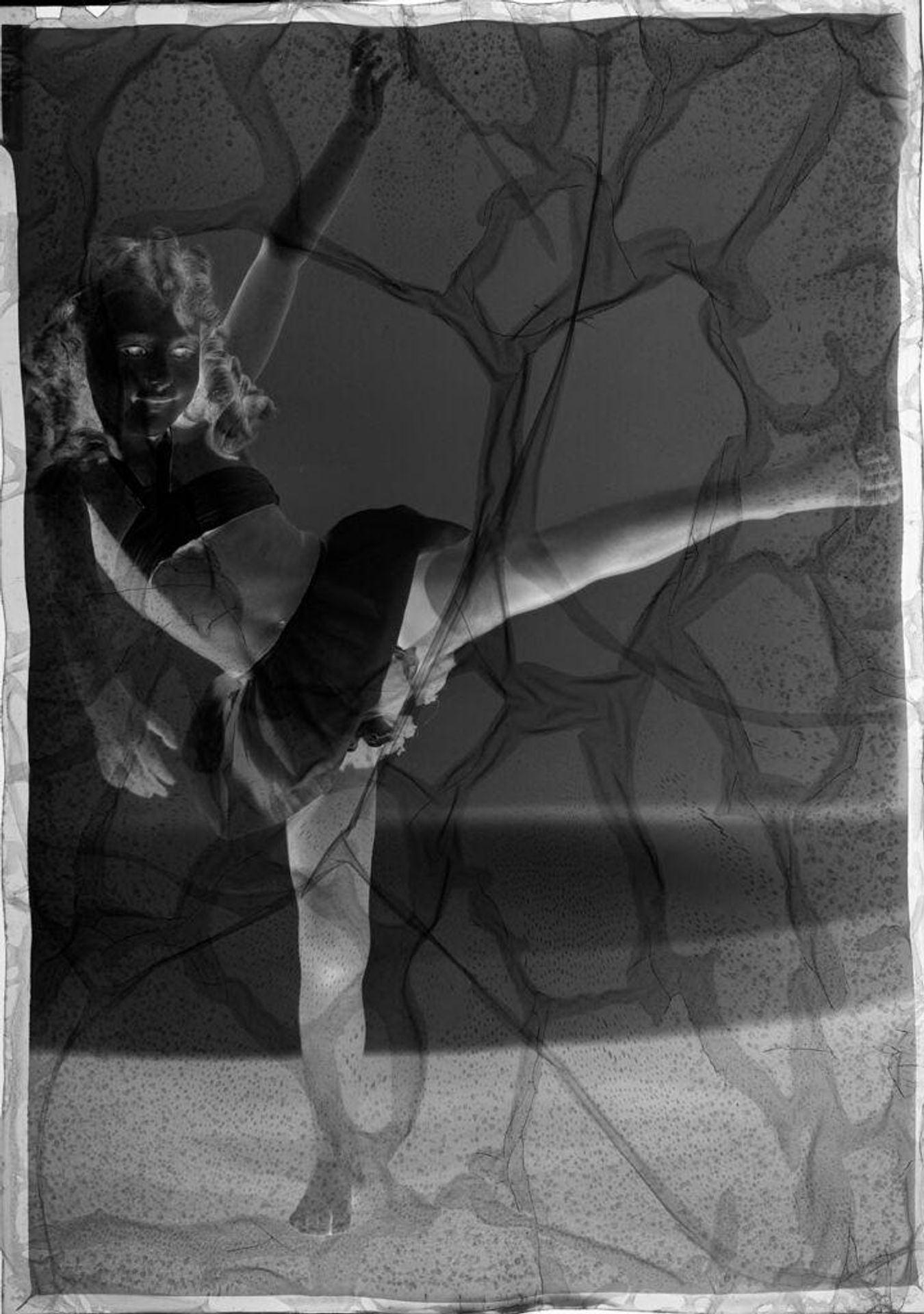 Untitled (little girl posing as ballerina, leg out) by Ken Whitmire Associates