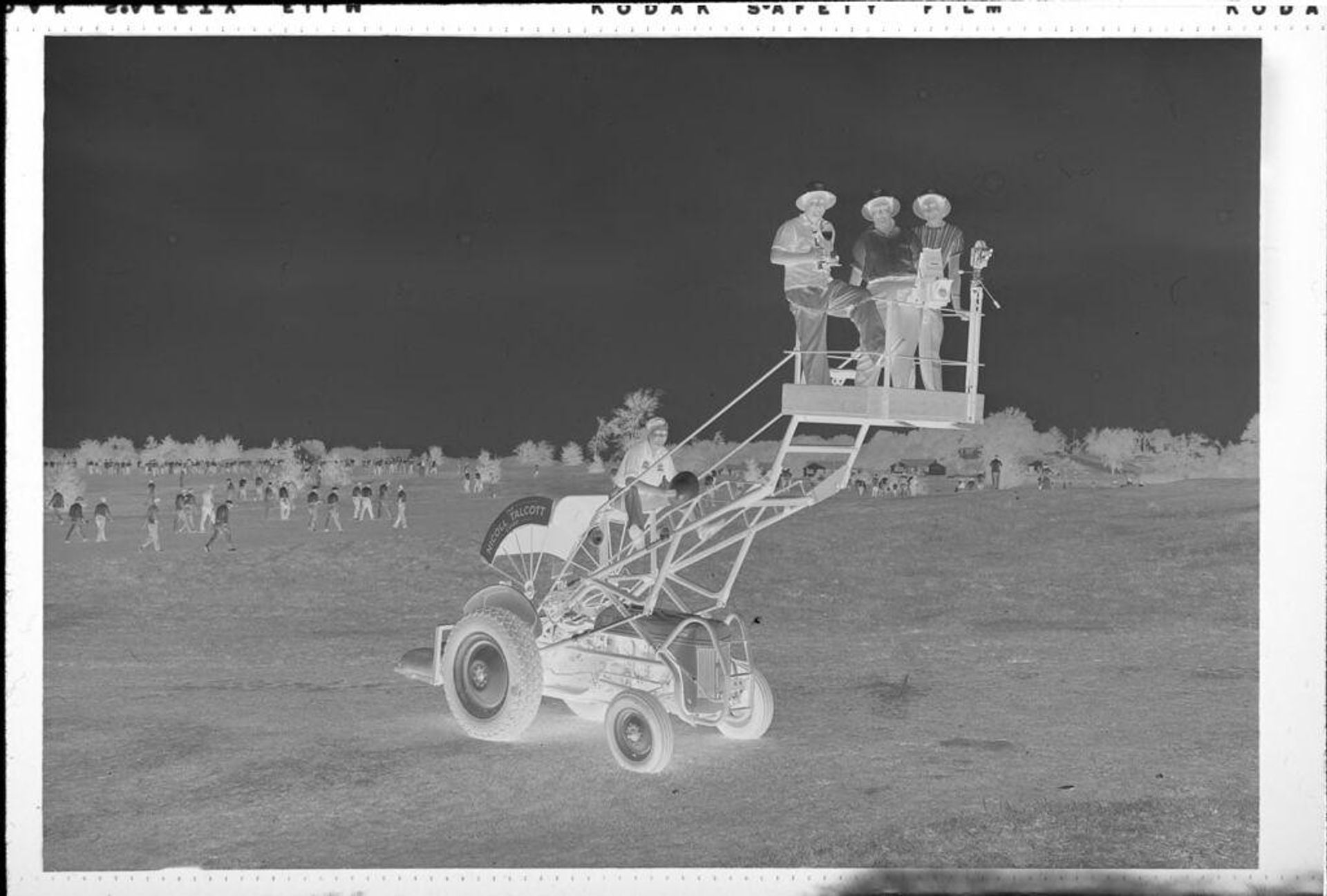 Untitled (golf tournament, men on tractor) by Robert Burian