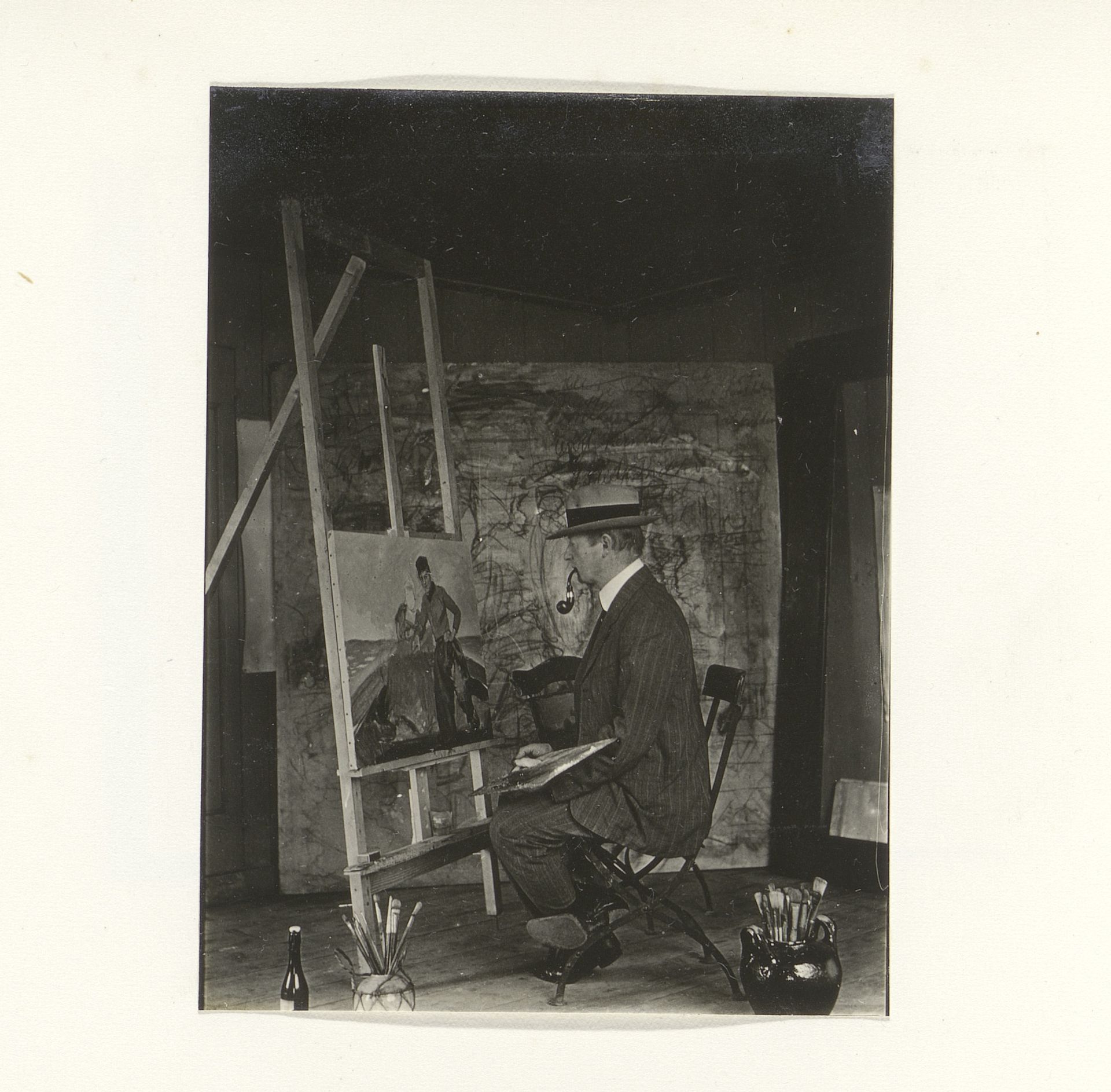 Man in een schildersatelier by G. Hidderley