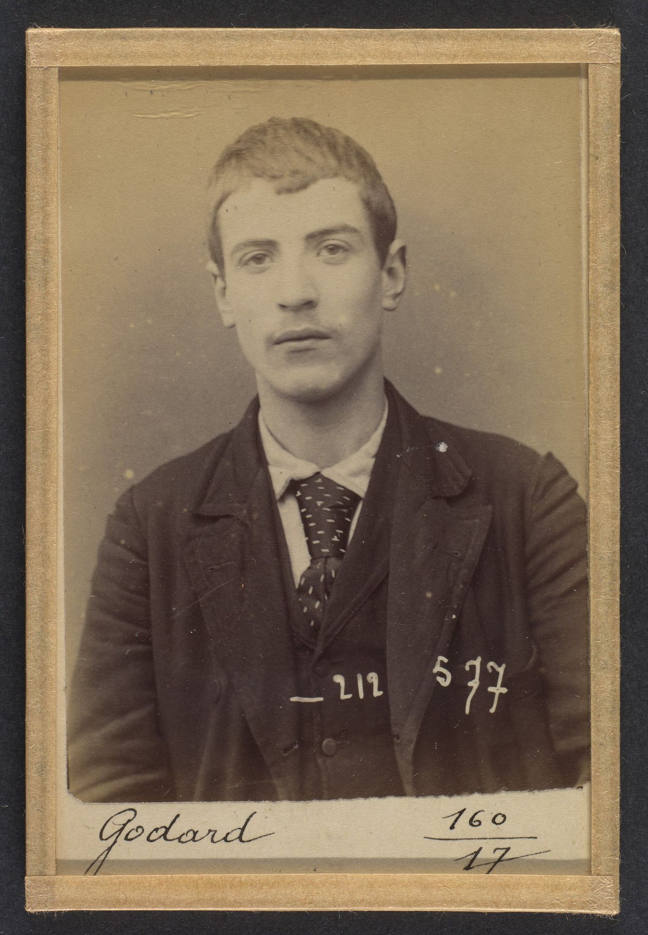 Godard. Armand, Alexandre. 18 ans, né le 11/3/75 à Paris XVIIe. Électricien. Cris séditieux. 6/1/94. by Alphonse Bertillon