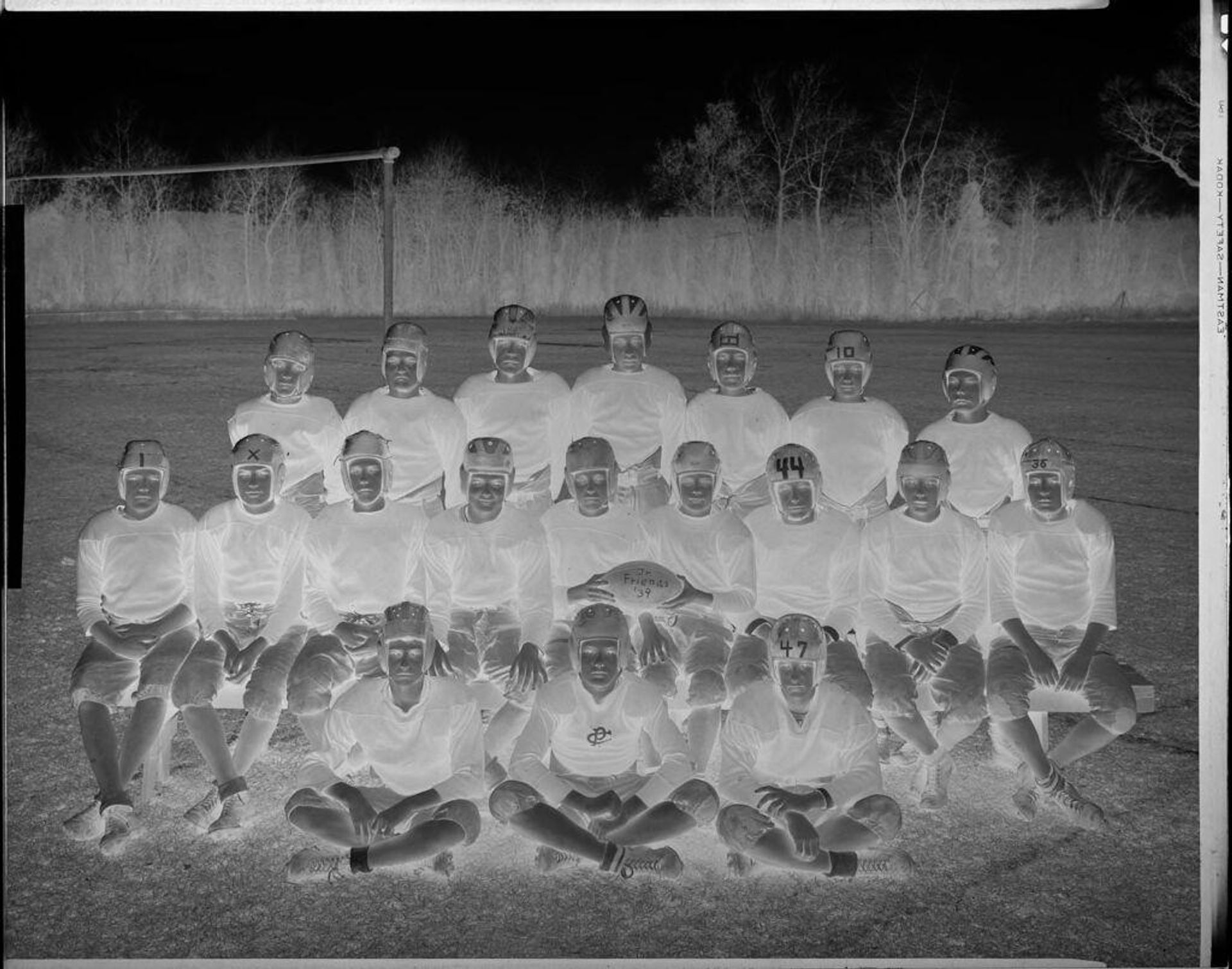 Untitled (older boyâs football team, Friends School) by Harris & Ewing