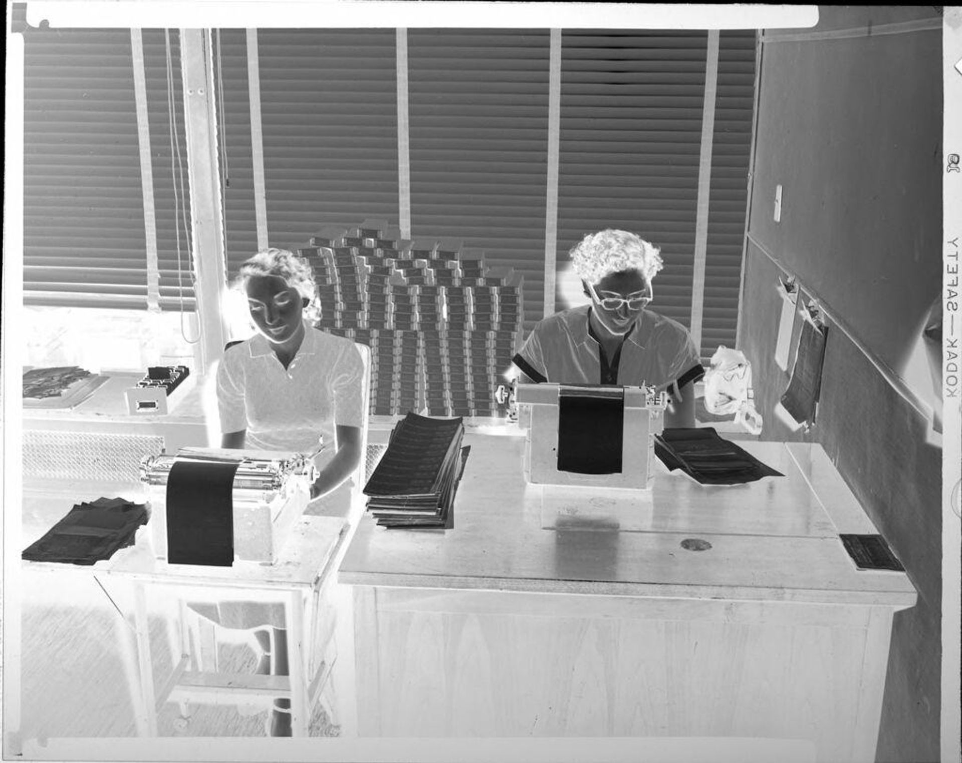 Untitled (women typing) by Peter James Studio