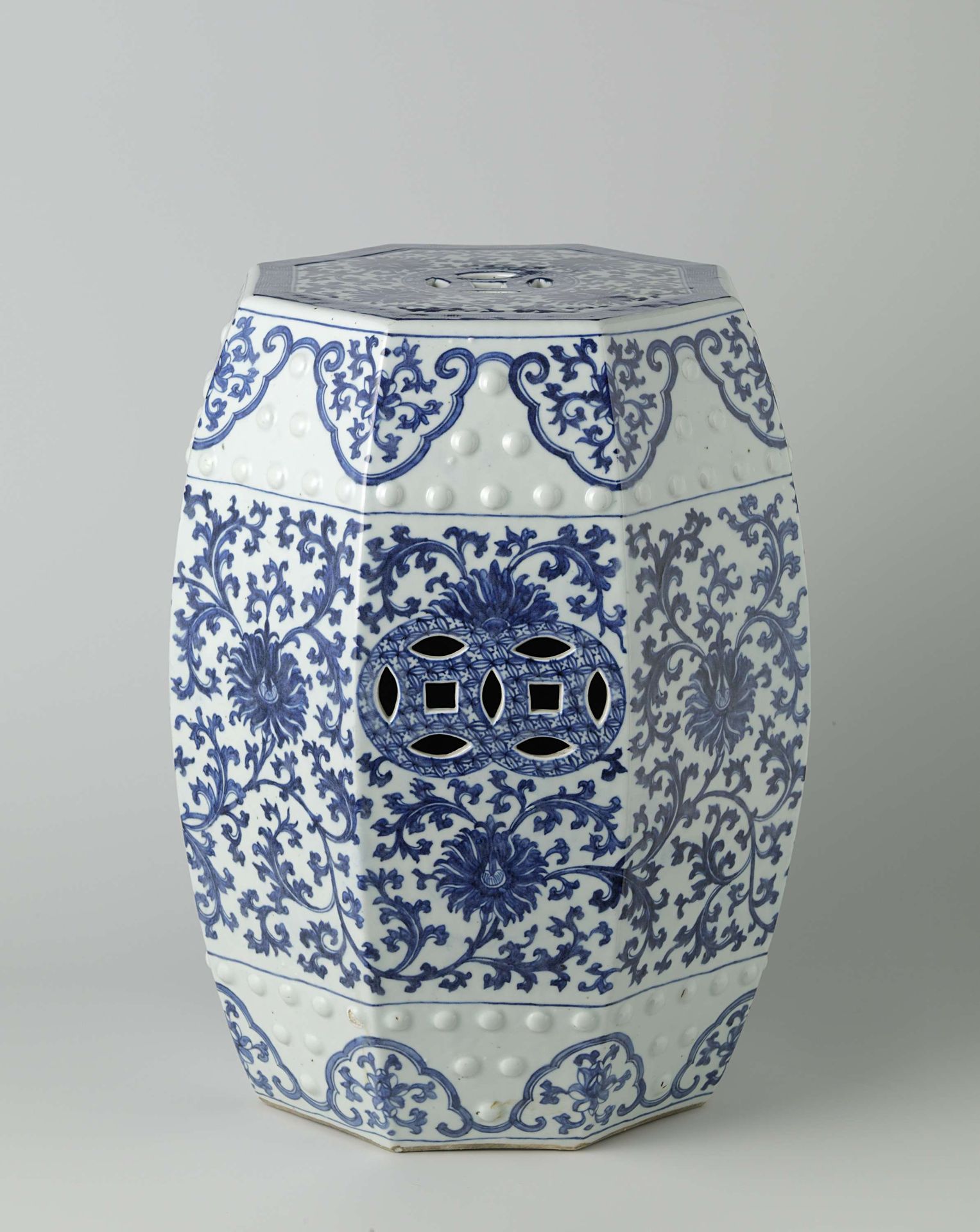 Octagonal garden seat with lotus scrolls by Anonymous