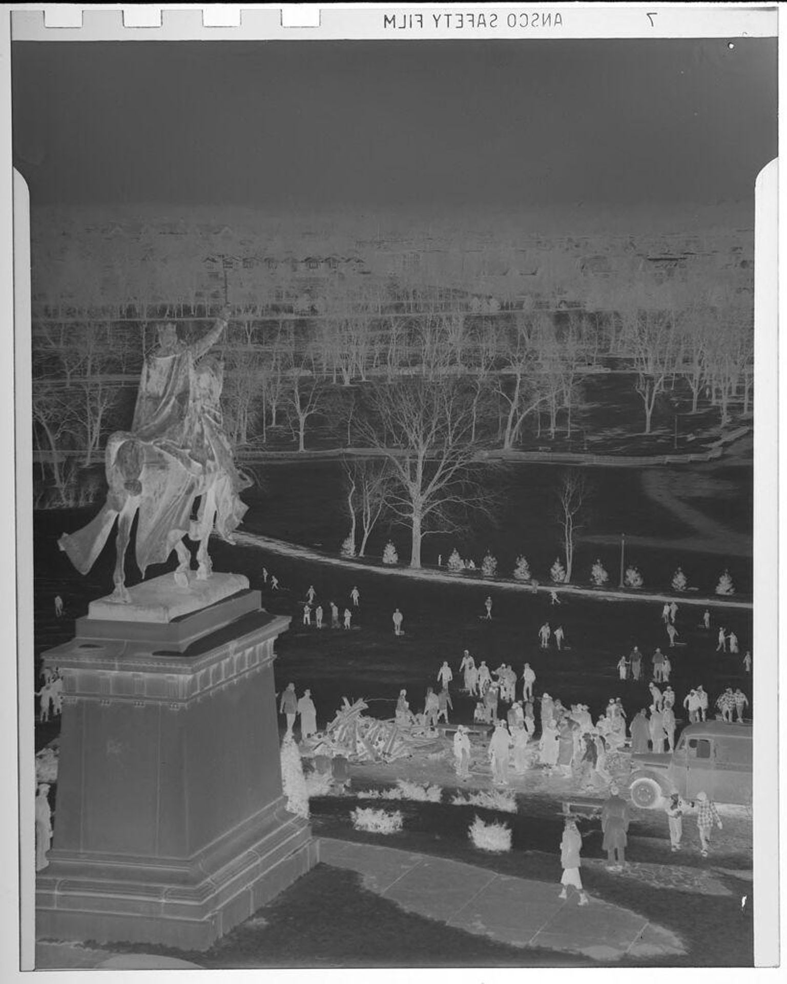 Untitled (euqestrian statue overlooking large outdoor park, people below) by Jack Gould