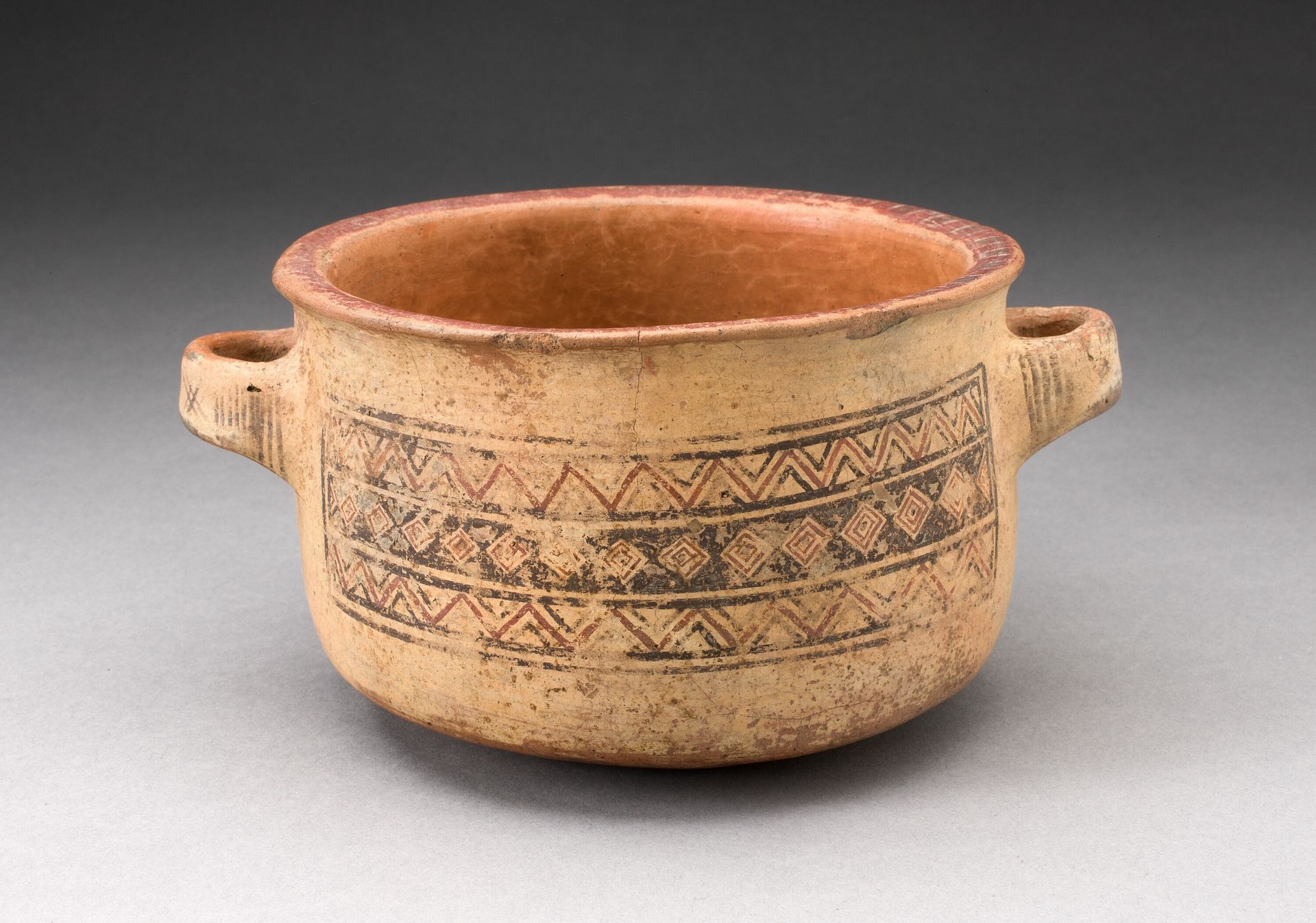 Minature Handled Bowl with Textile-like Design by Inca