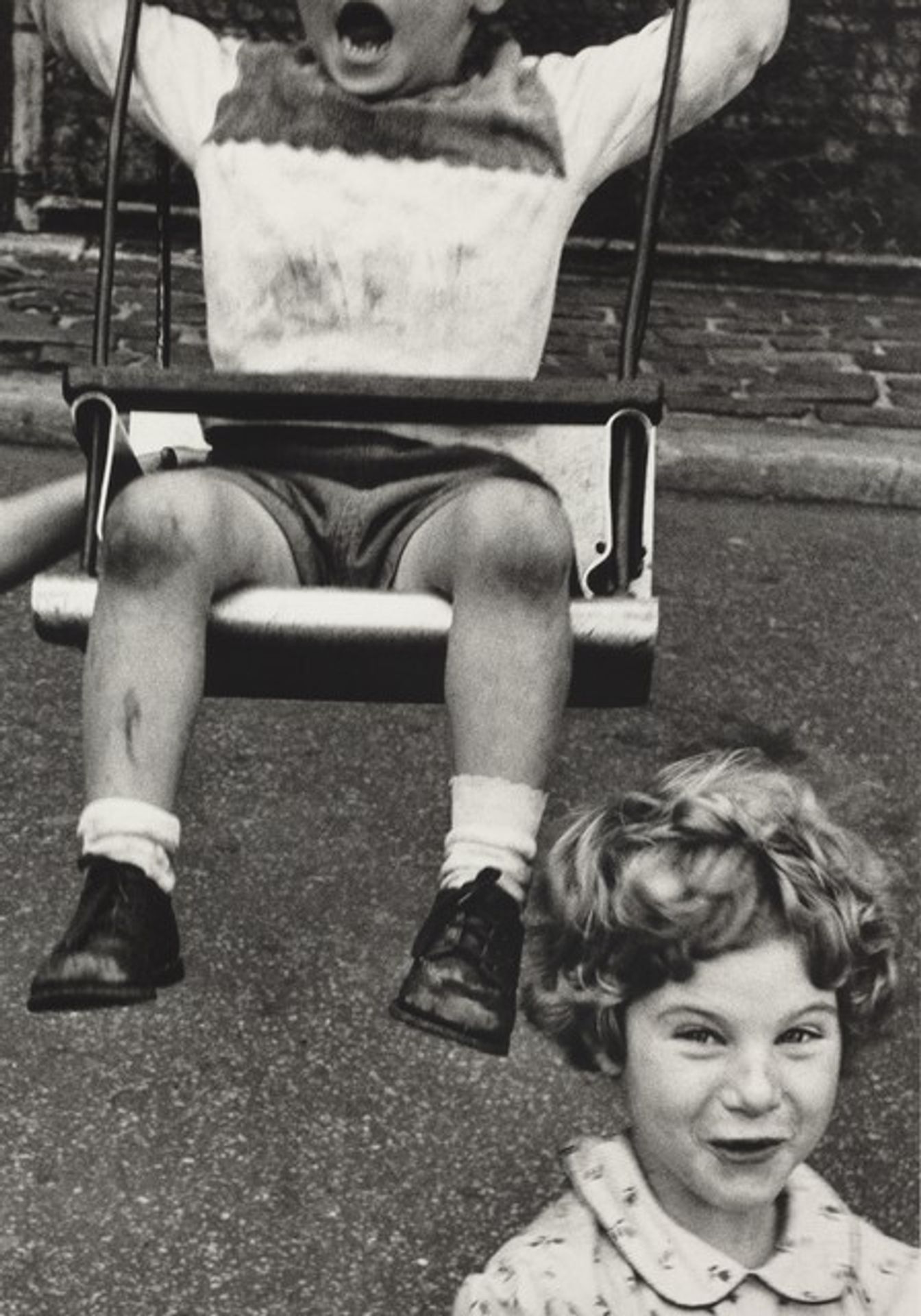 Boy + Girl + Swing, New York by William Klein