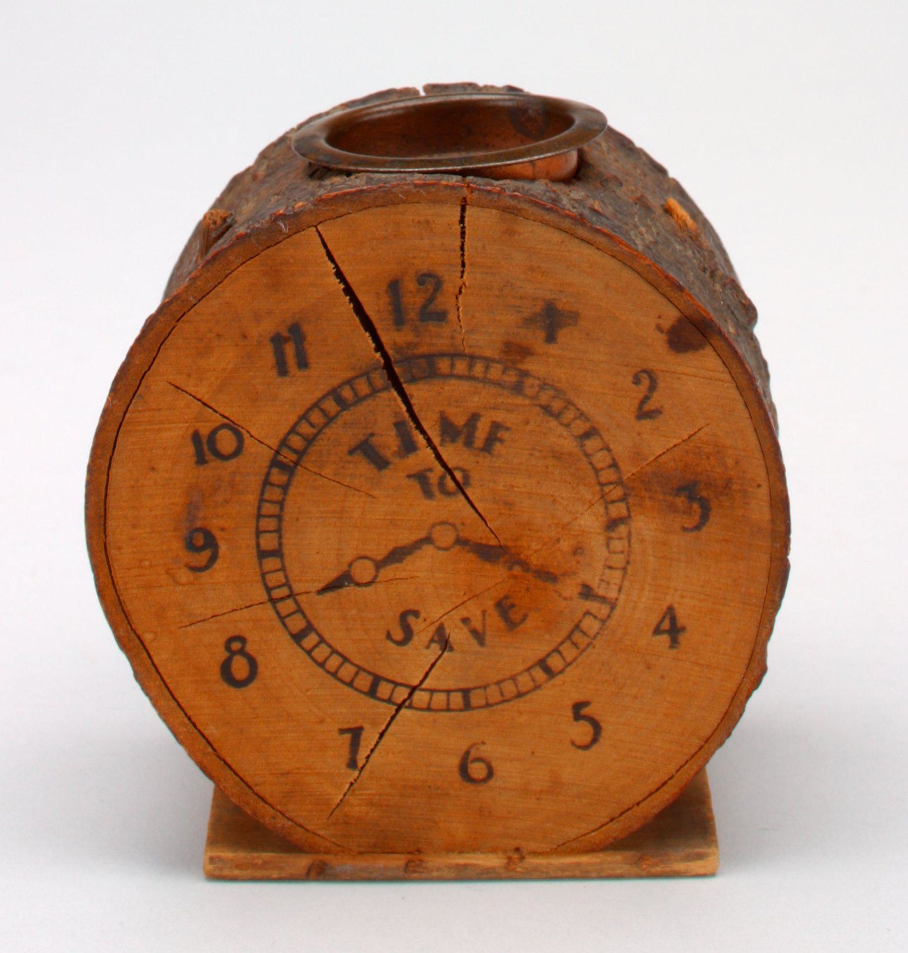 -Time to Save (tree-stump clock)- still bank by Anonymous