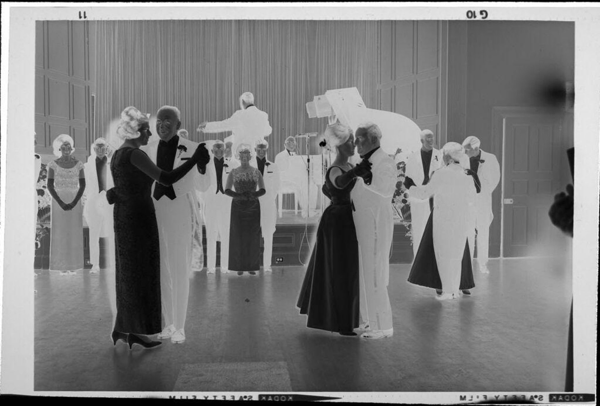 Untitled (people dancing at ball) by Robert Burian