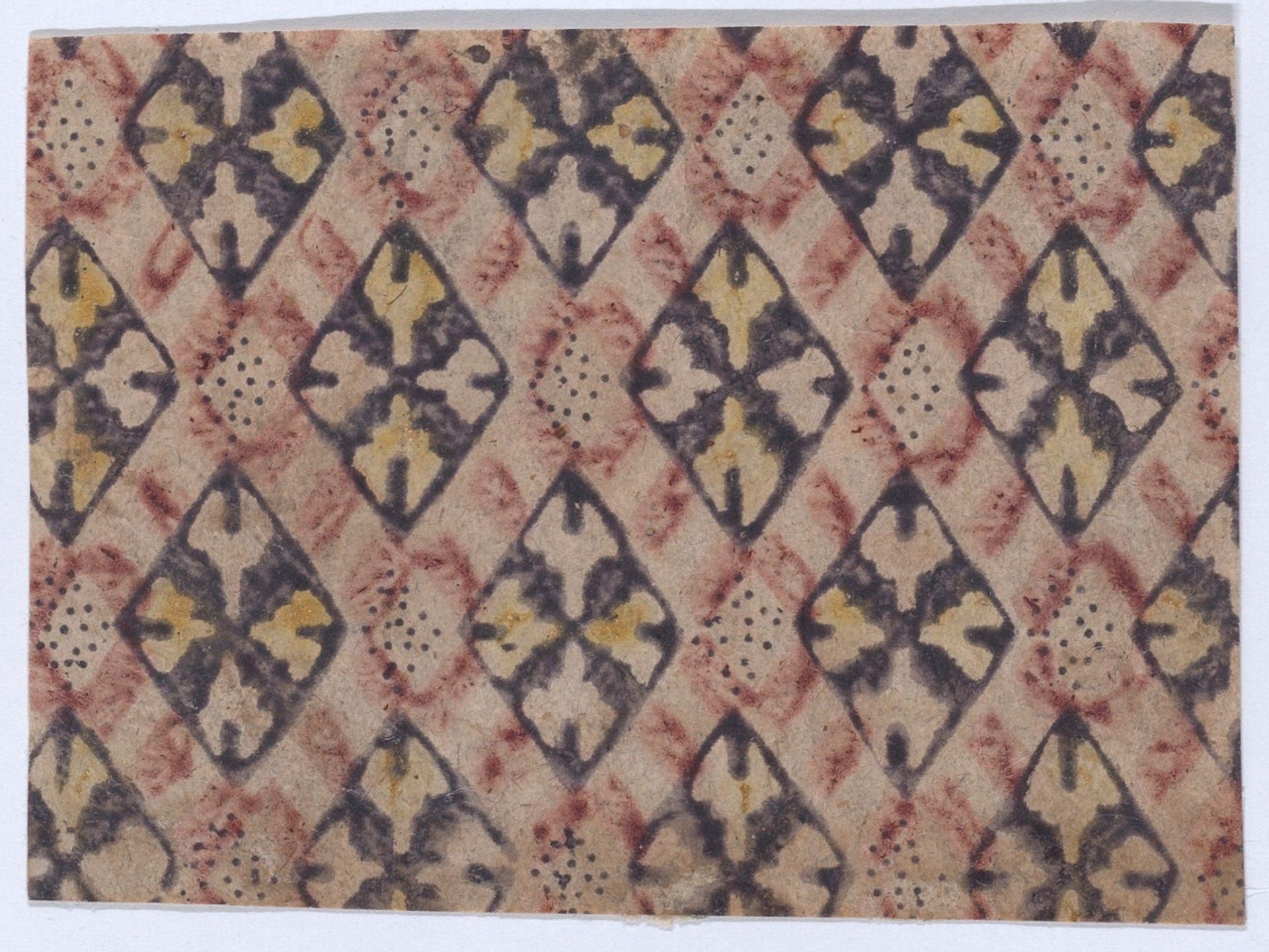 Sheet with alternating red, navy, and yellow ornate diamond outlines, with small black dots by Anonymous