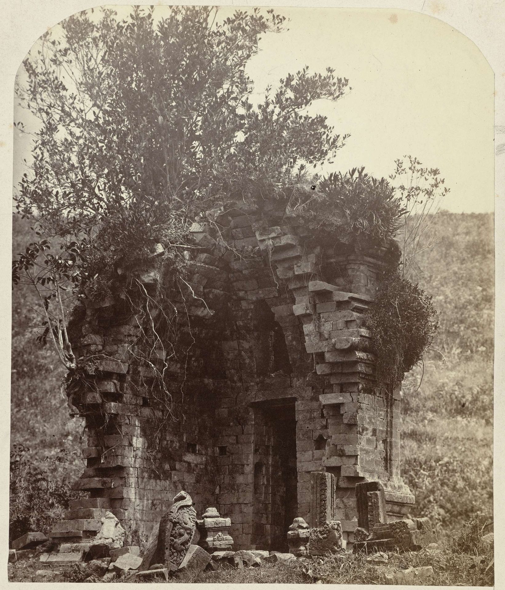 Candi Parakesit, general view of the ruined temple and the scattered sculputal and architectural reamins; the temple dissapeared in 1873. Dieng Plateau, Wonosbo district, Central Java province 8th- 9th century. by Isidore Kinsbergen