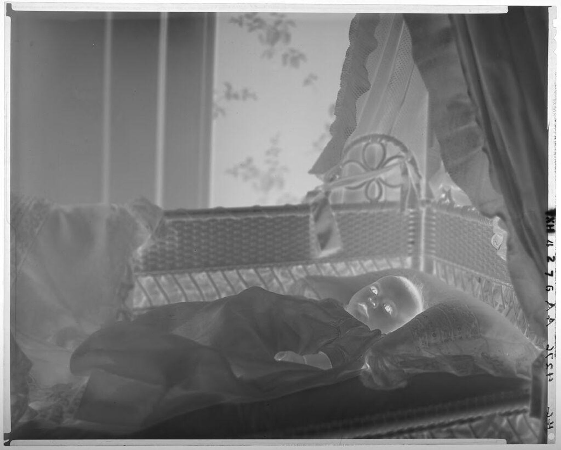Untitled (baby in bassinet) by Paul Gittings