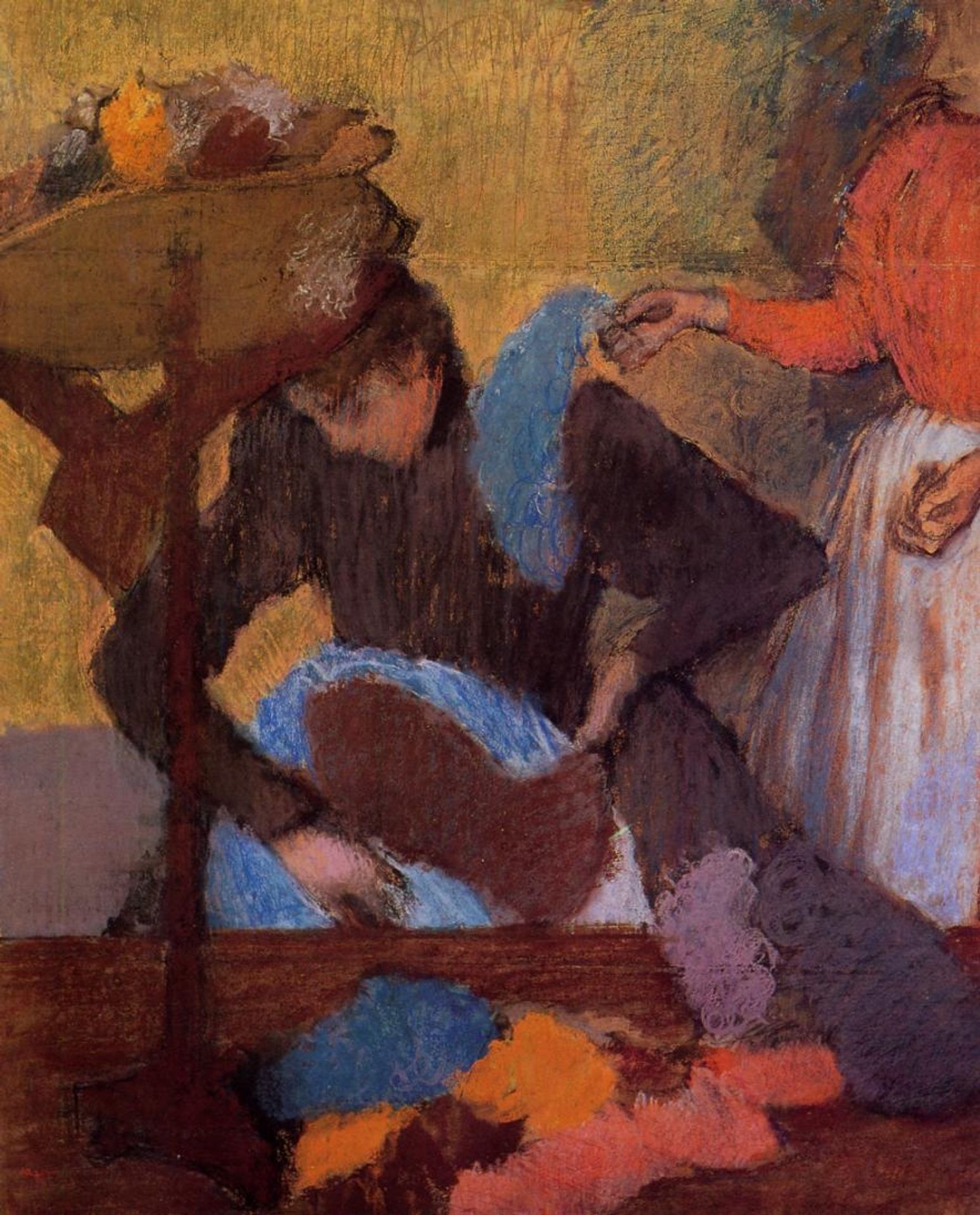 At the Milliner's by Edgar Degas