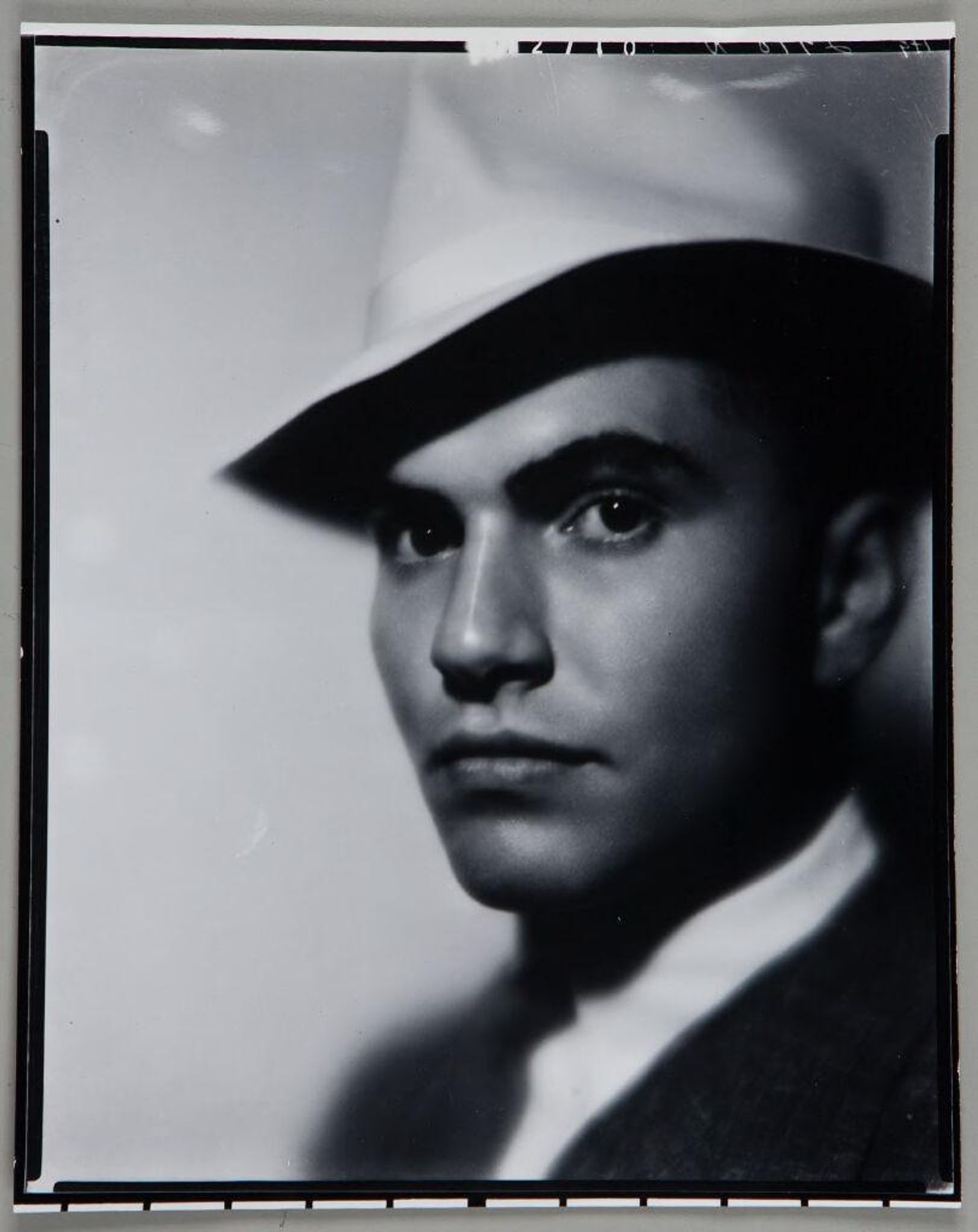 Untitled (young man in fedora) by Paul Gittings