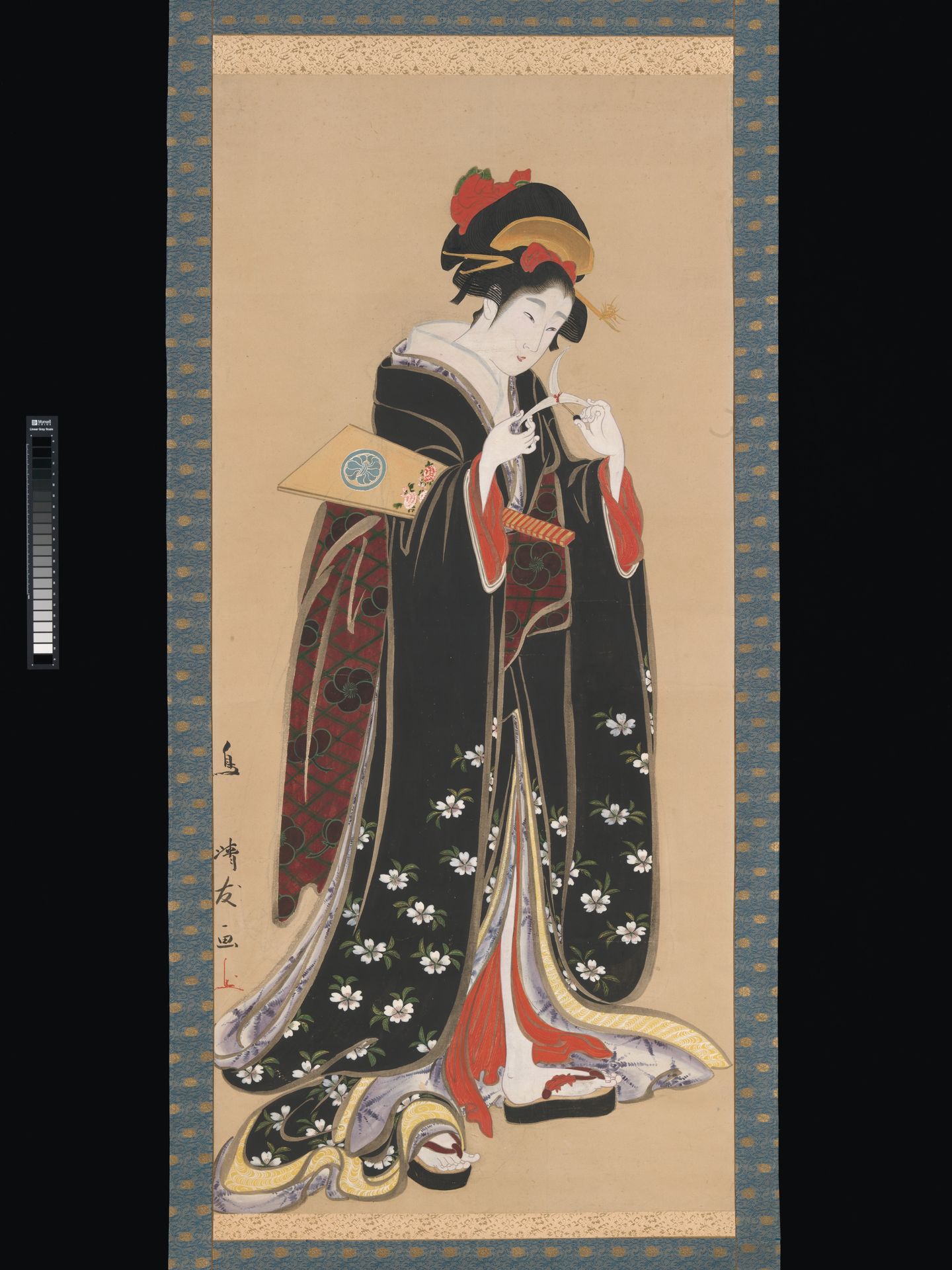 Woman with Battledore and Shuttlecock by Torii Kiyotomo