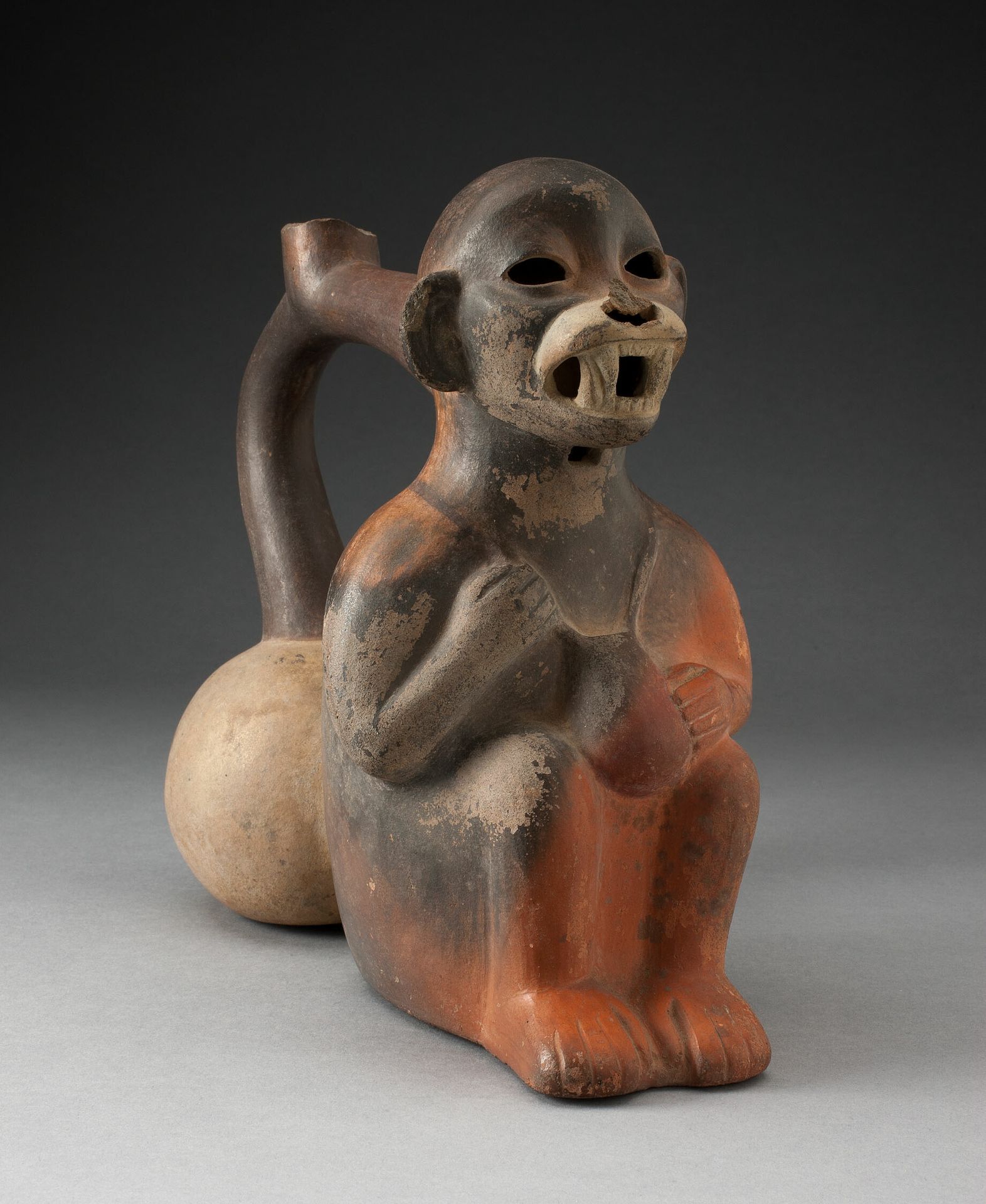 Double Vessel in the Form of a Seated Monkey with Coca Bag Around Neck by Moche
