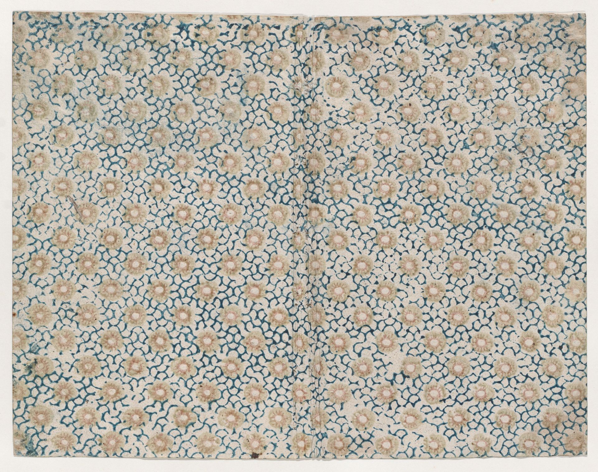Book cover with yellow floral pattern atop blue curved lines by Anonymous