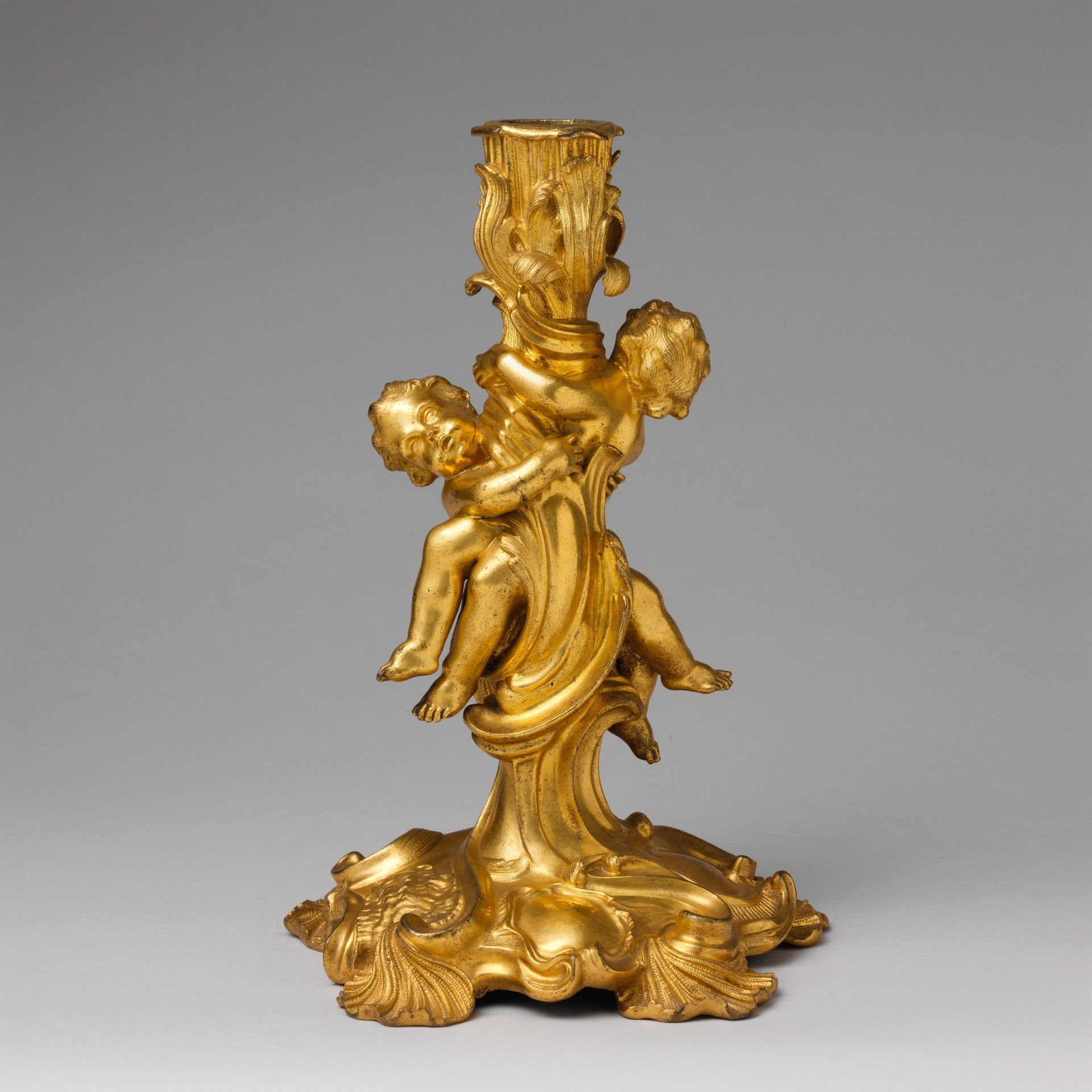 Pair of candlesticks by Juste Aurèle Meissonnier