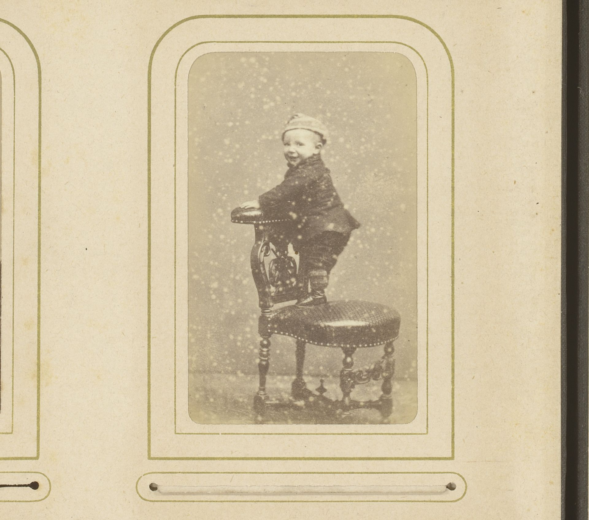 Portret van een jongen, staand op een stoel by Charles Binger