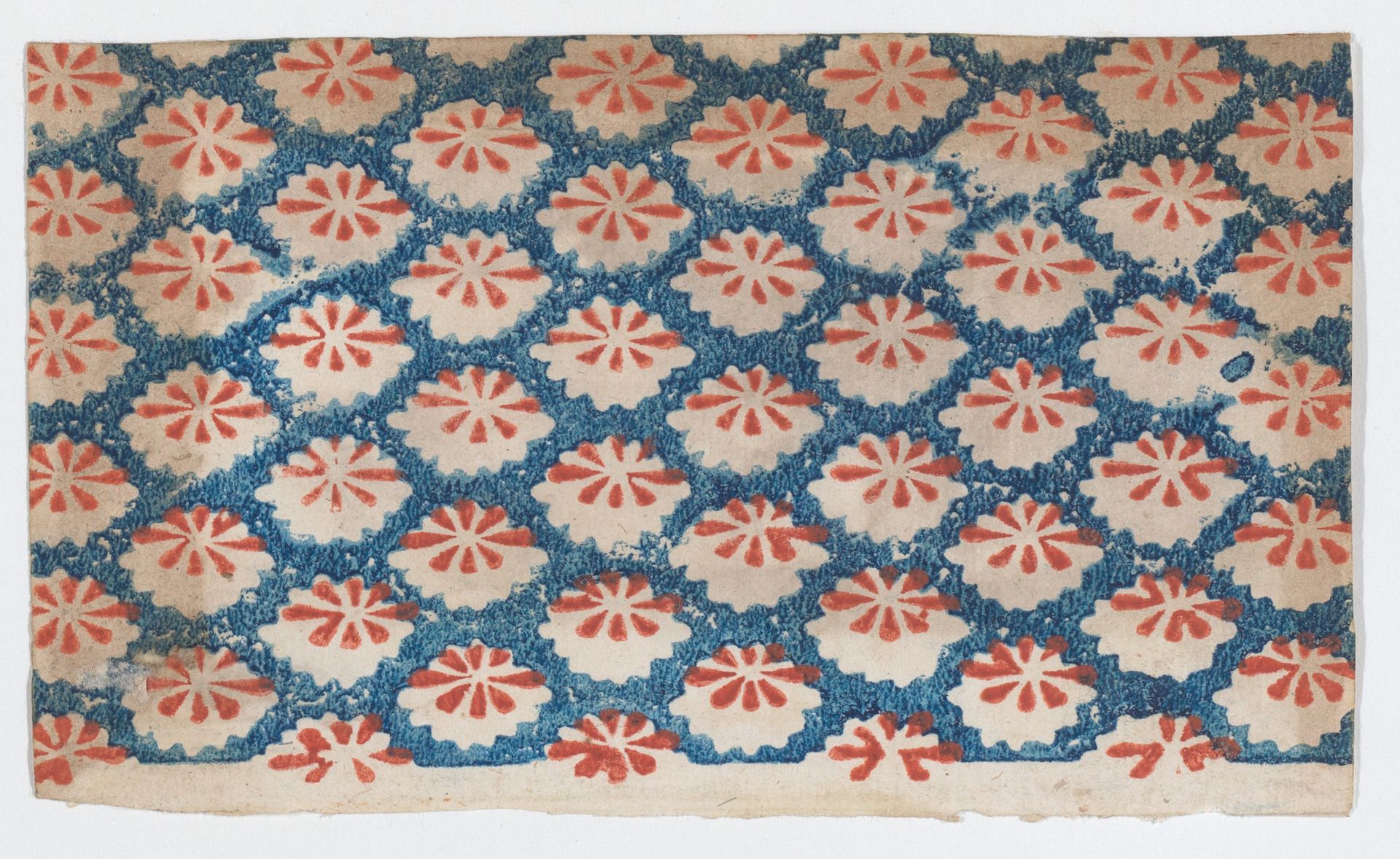 Sheet with overall pattern of ovals with red designs by Anonymous