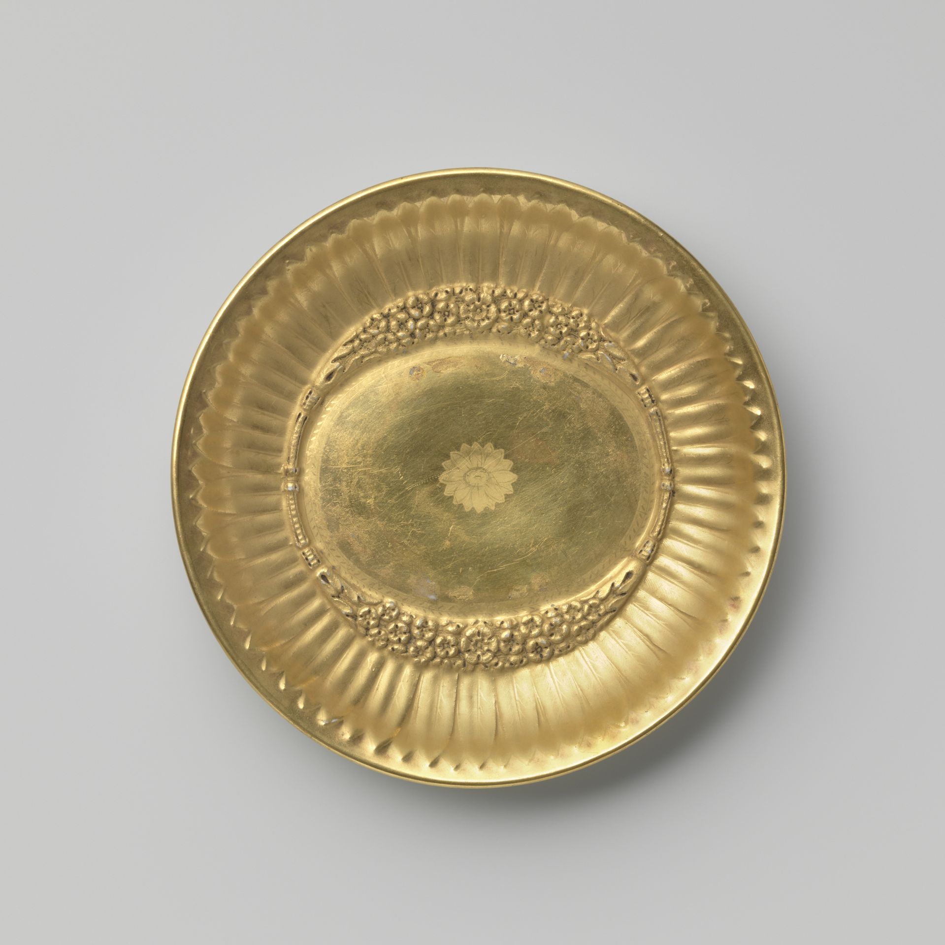 Saucer with petals, a roundel and garlands by Limoges