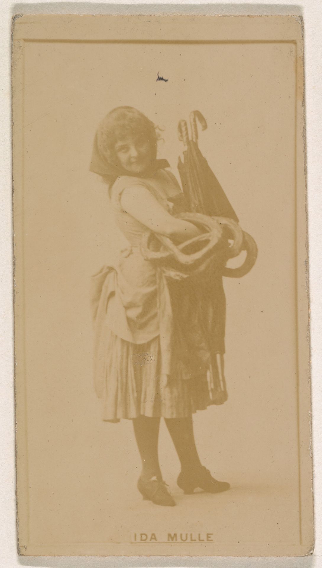 Ida Mulle, from the Actresses series (N245) issued by Kinney Brothers to promote Sweet Caporal Cigarettes by Kinney Brothers Tobacco Company
