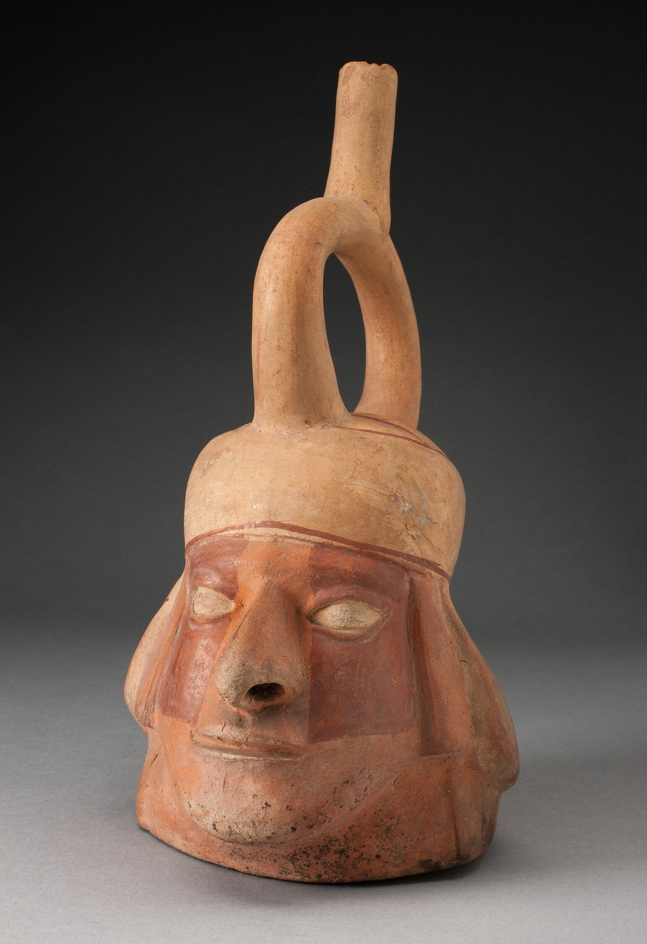 Portrait Vessel in the Form of an Abstract Human Head by Moche