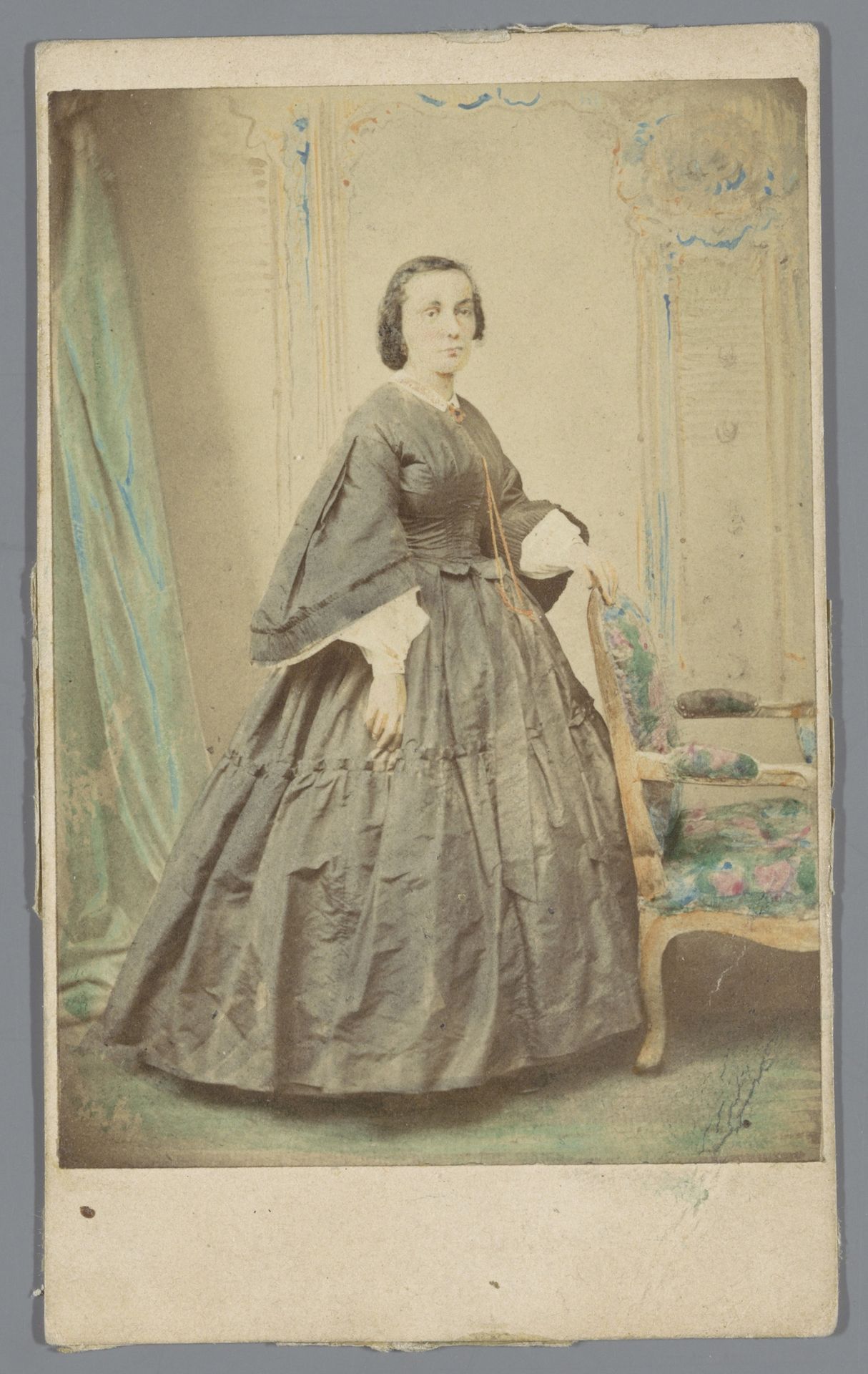 Portret van een onbekende vrouw bij een stoel by Gustave Pierre Louis Aimé Margain