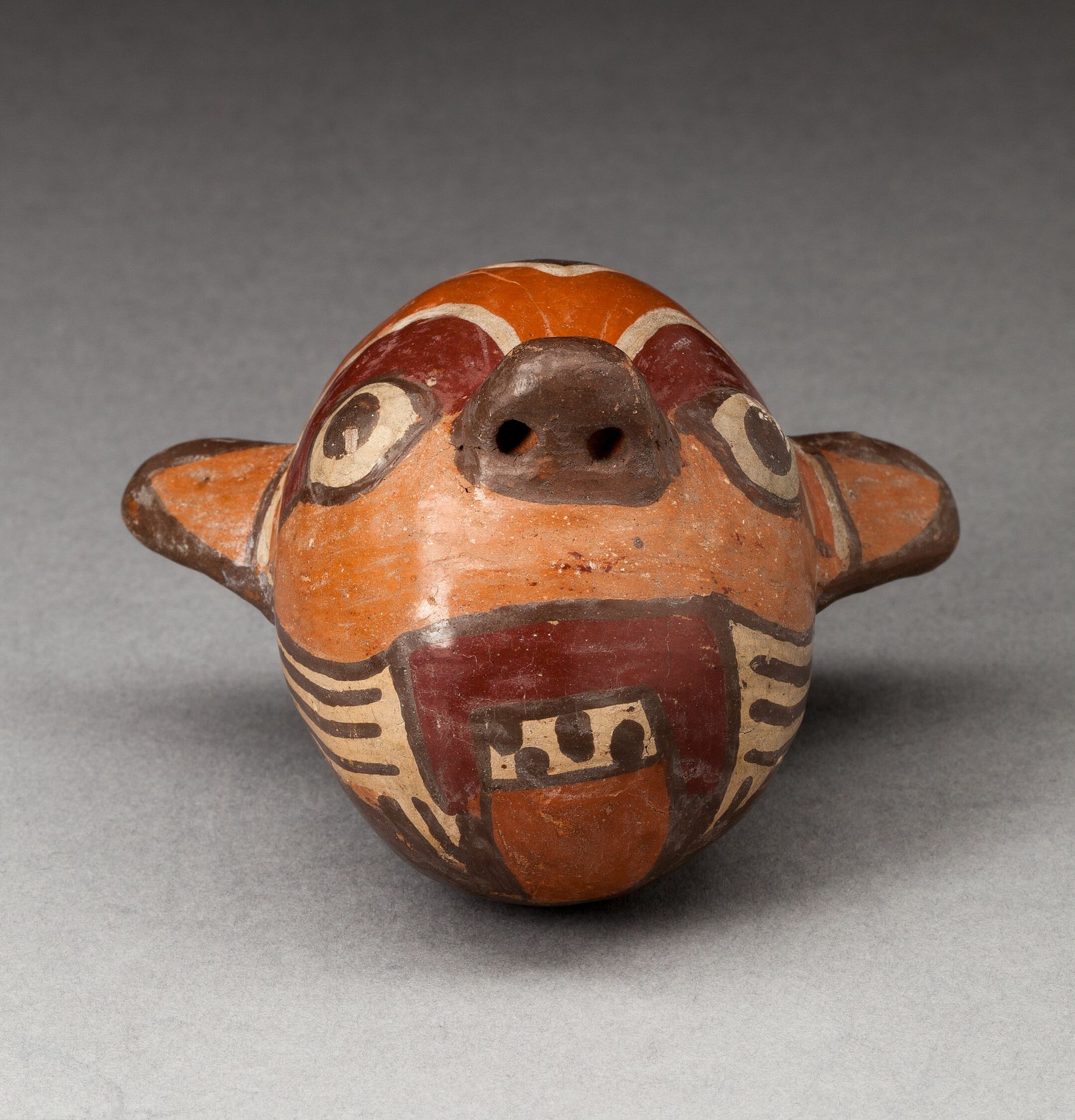 Miniature Vessel in the Form of a Feline Head by Nazca