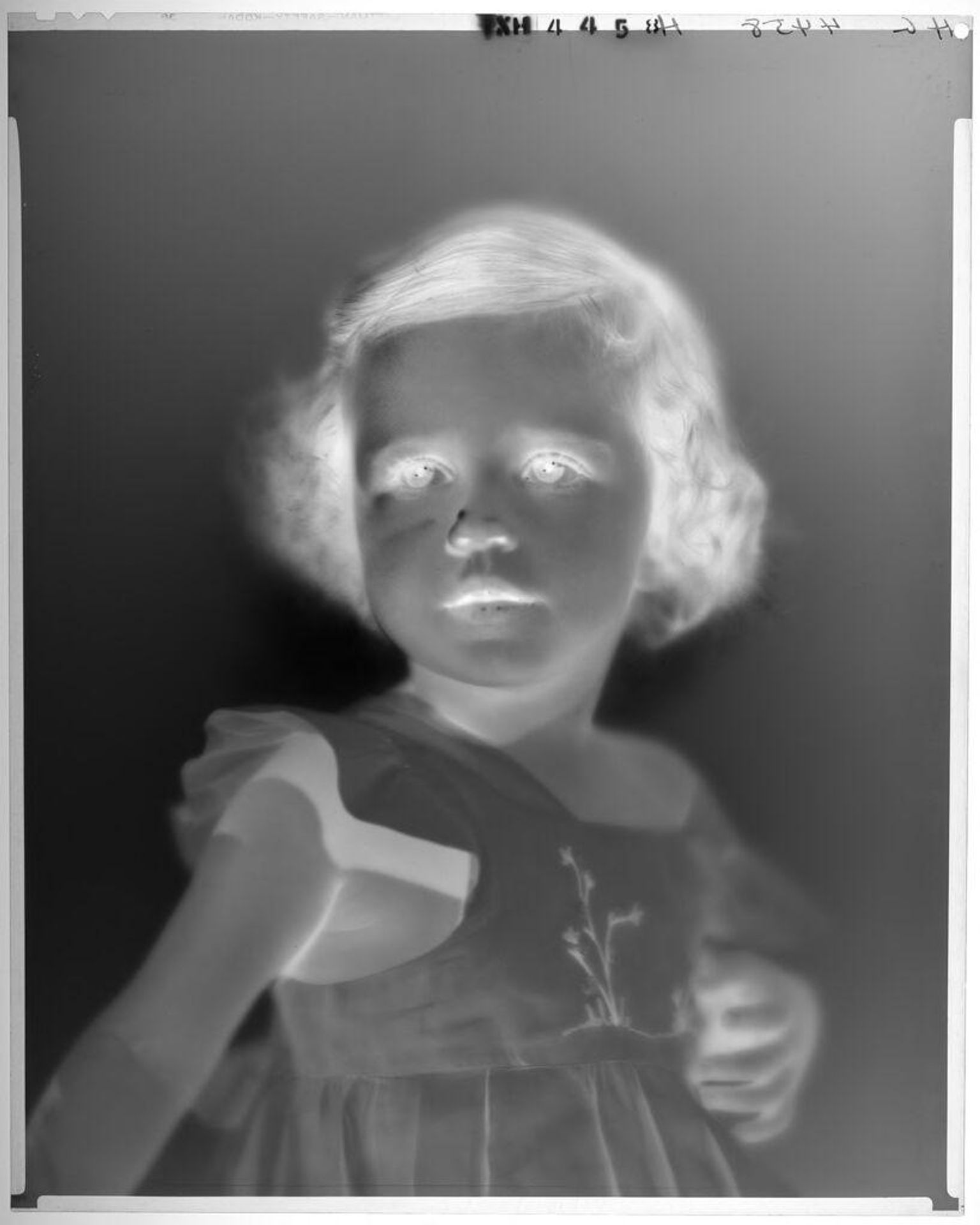 Untitled (portrait of little girl in sundress with floral motif) by Paul Gittings