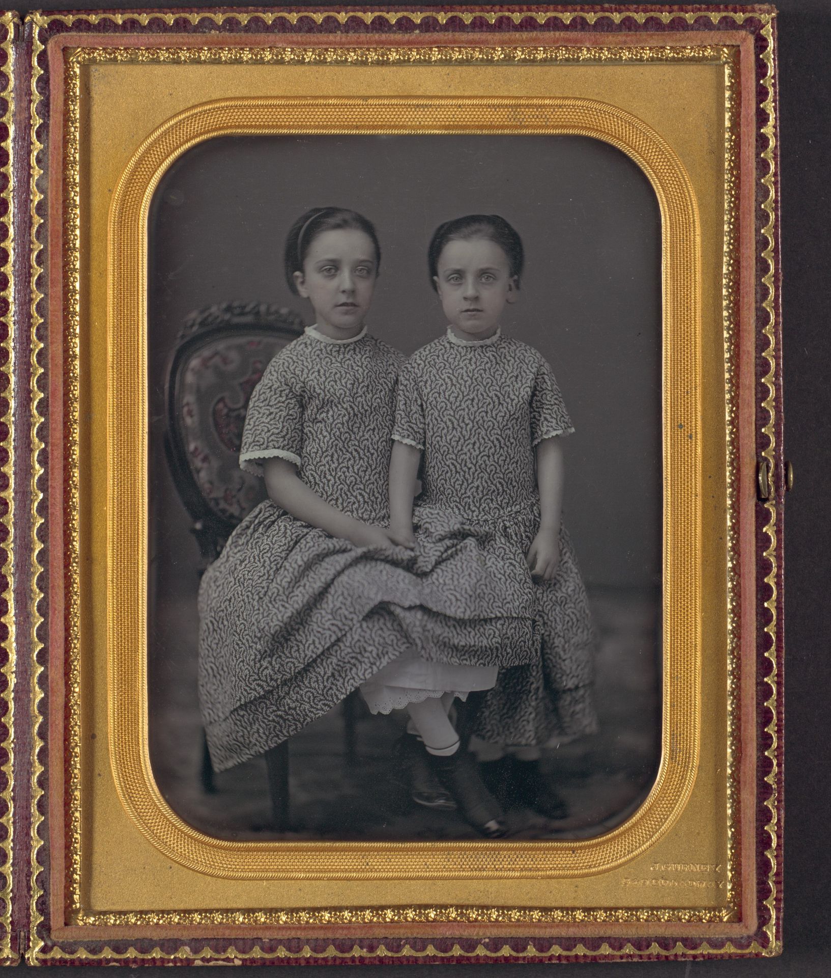 [Two Girls in Identical Dresses] by Jeremiah Gurney