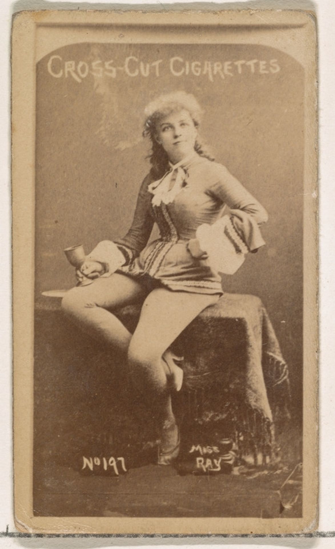Card Number 197, Miss Ray, from the Actors and Actresses series (N145-1) issued by Duke Sons & Co. to promote Cross Cut Cigarettes by W. Duke, Sons & Co.
