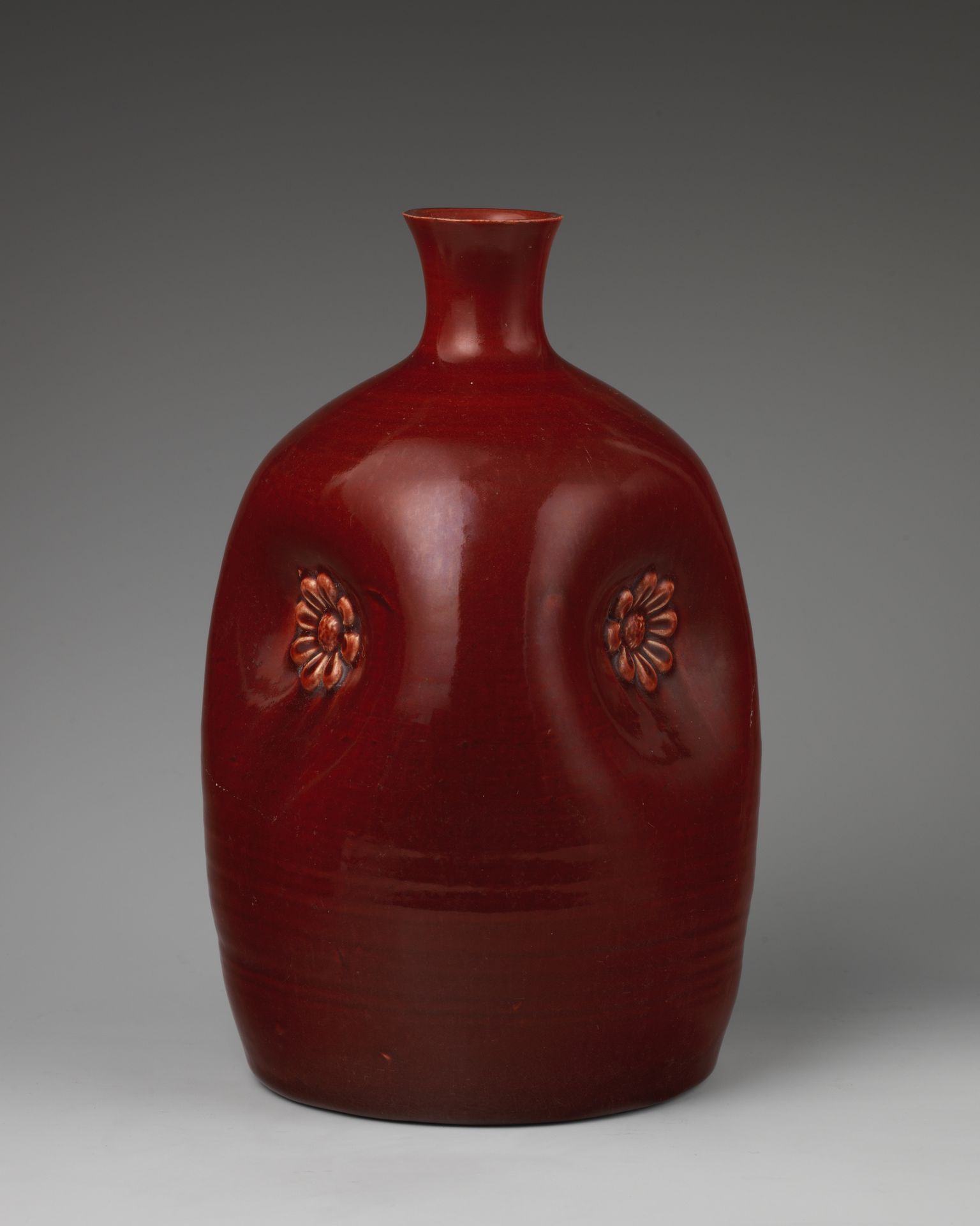 Pinch bottle by Christopher Dresser