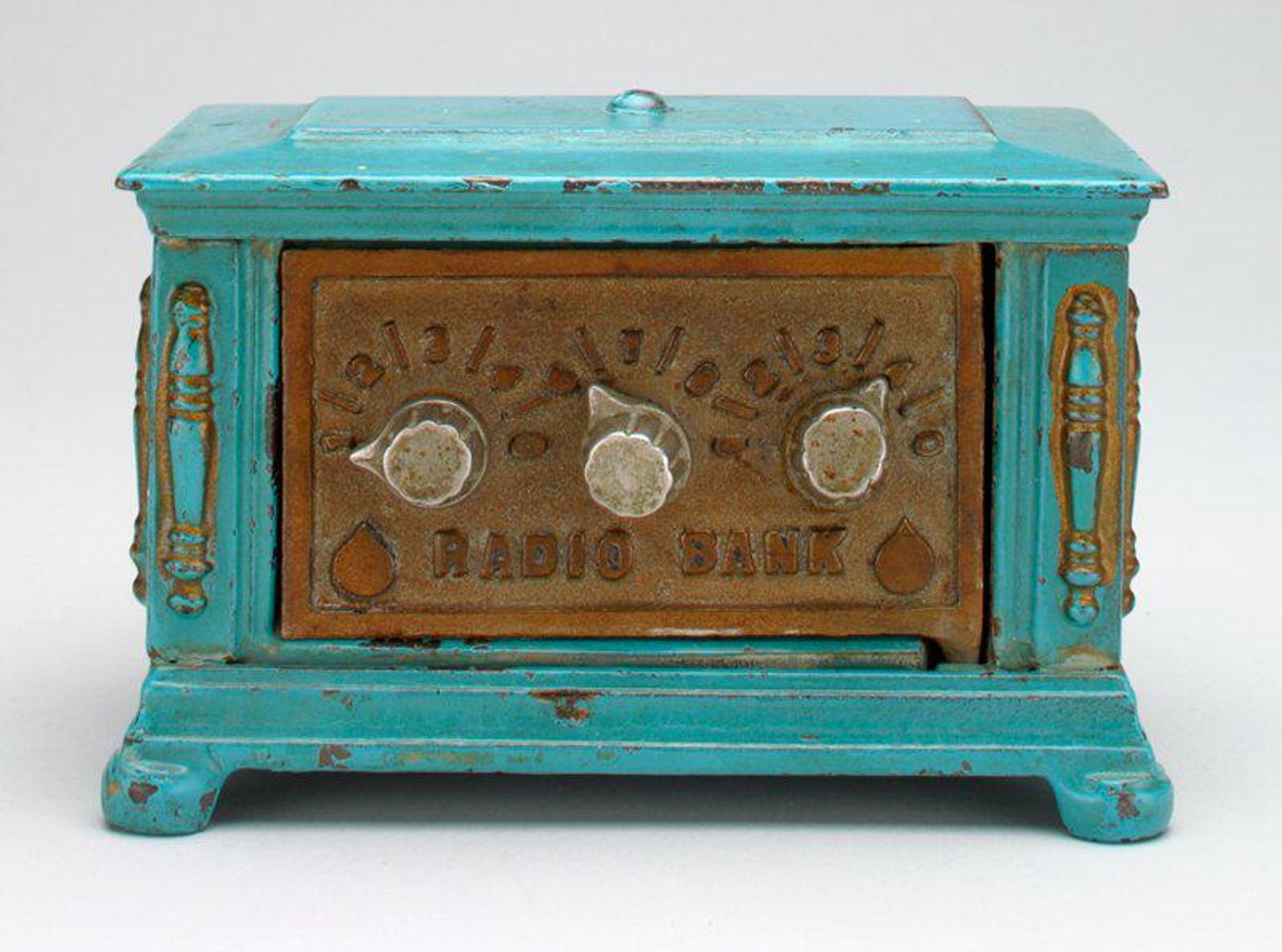 -Radio Bank by Kenton Hardware Manufacturing Co.