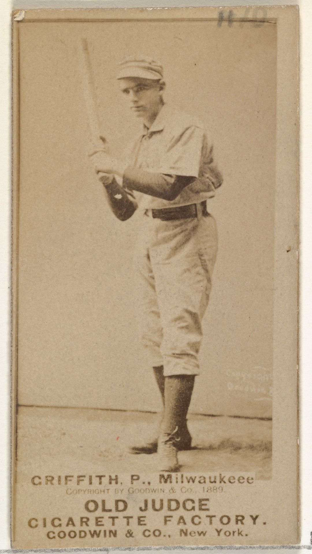 Clark Calvin "Old Fox" Griffith, Pitcher, Milwaukee, from the Old Judge series (N172) for Old Judge Cigarettes by Goodwin & Company