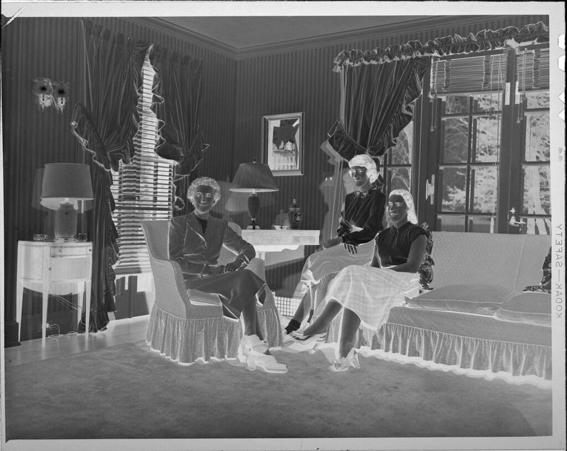 Untitled (three women in living room) by Lucian and Mary Brown