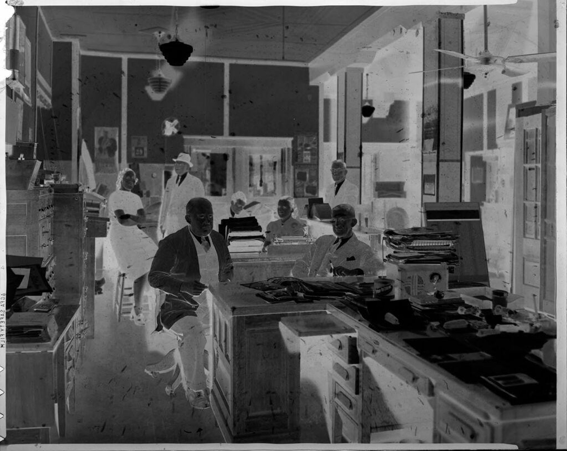 Untitled (men and women in office) by Hamblin Studio