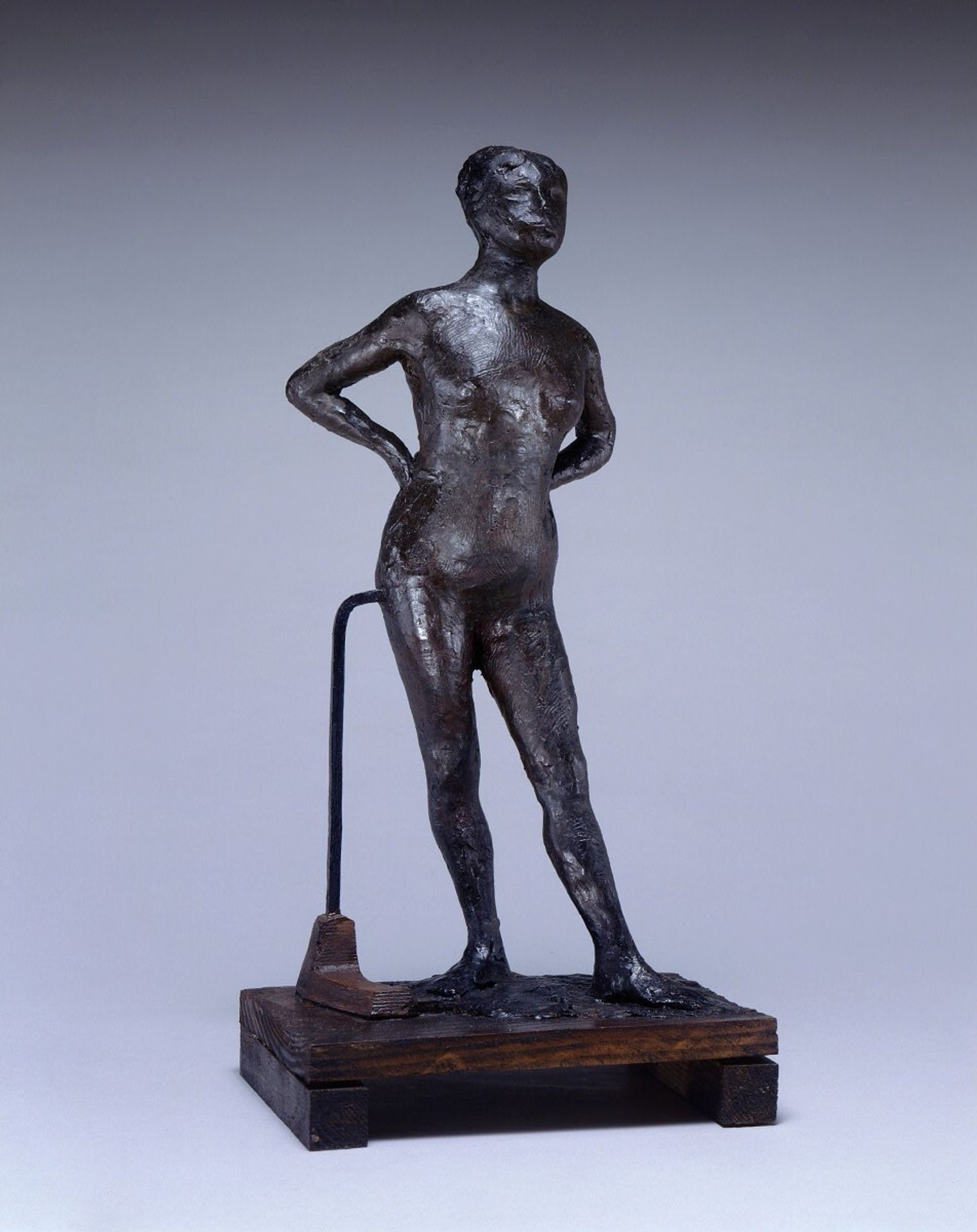 Dancer at Rest, Hands on Her Hips, Left Leg Forward by Edgar Degas