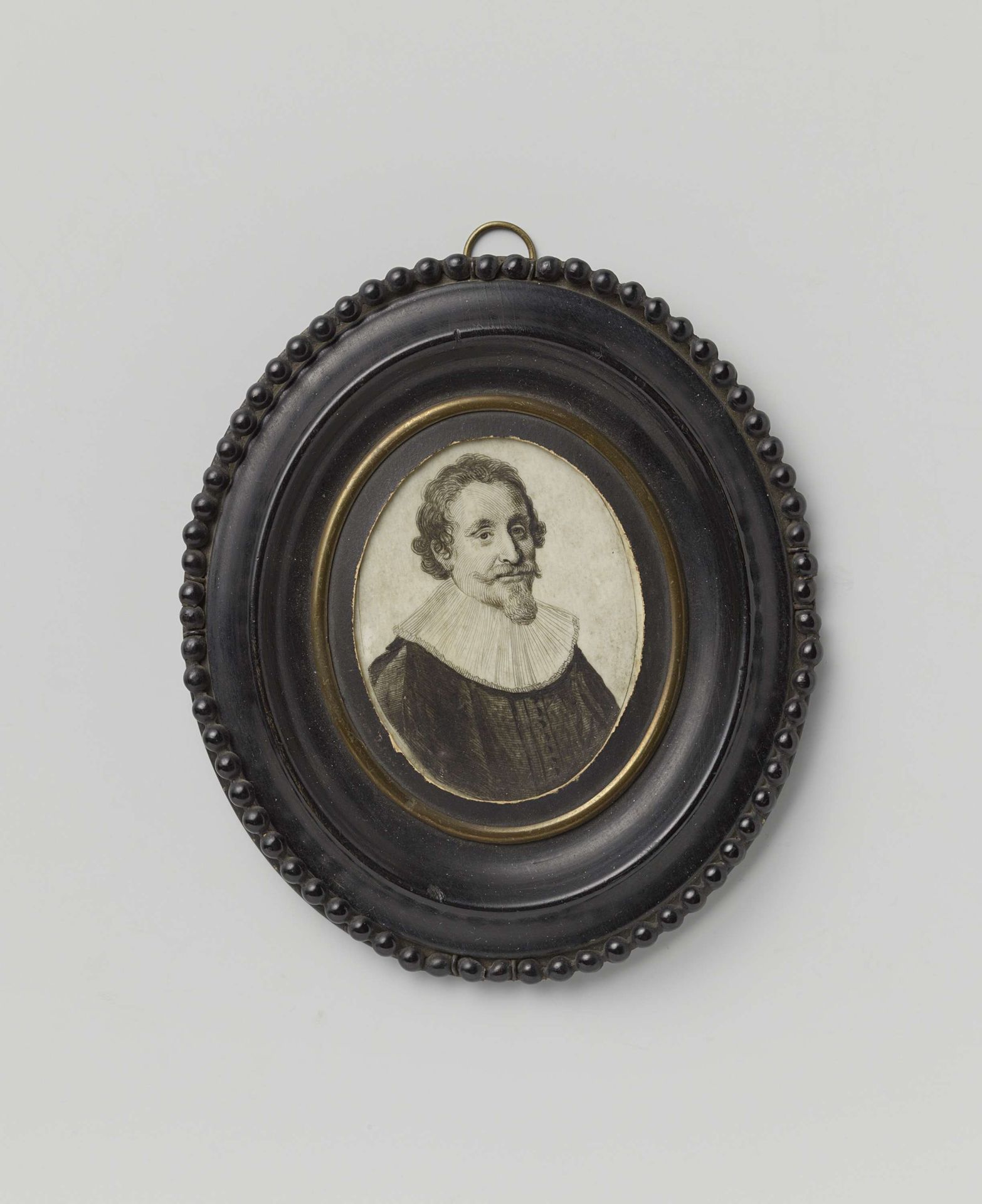 Portret van Hugo de Groot in lijst by Clemens Nachtegaal