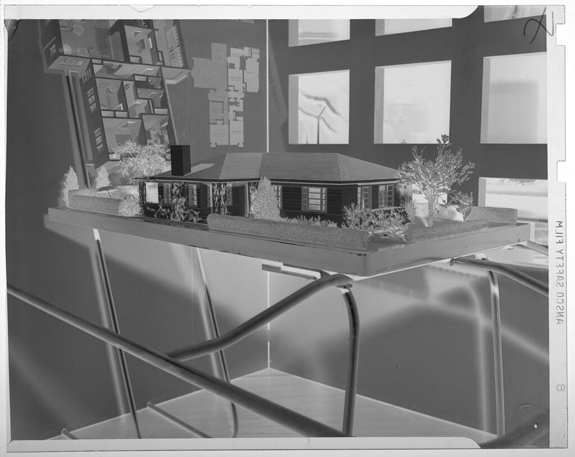 Untitled (architectural model of a house on a table; second model in background) by Jack Gould
